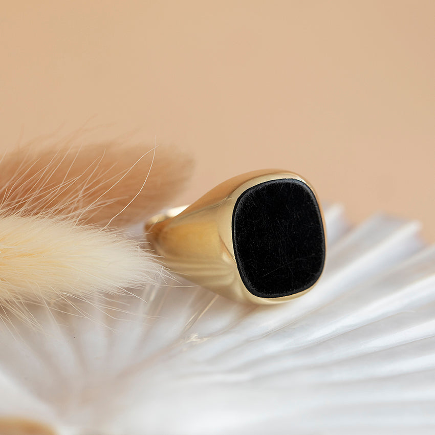 Men's 14 karat gold ring with onyx