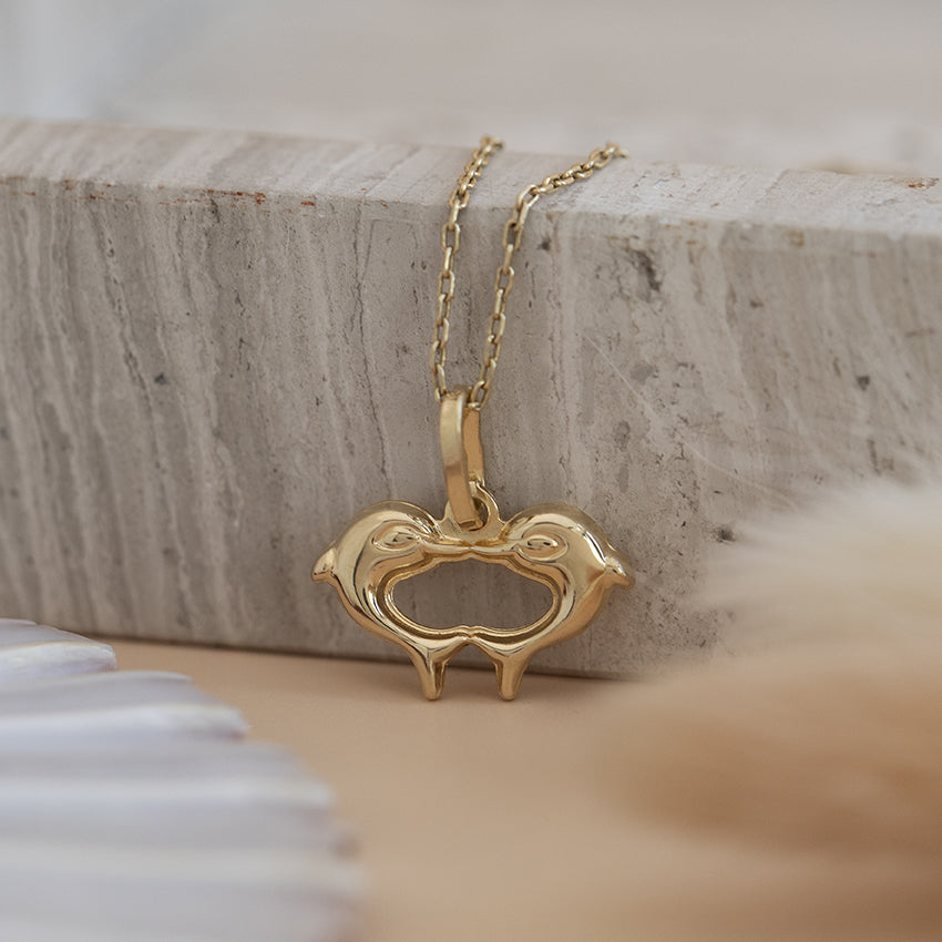 Gouden dolfijnen hanger 18 karaat