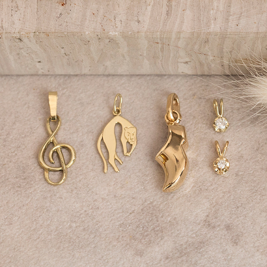 Gouden hanger muzieknoot 14 karaat