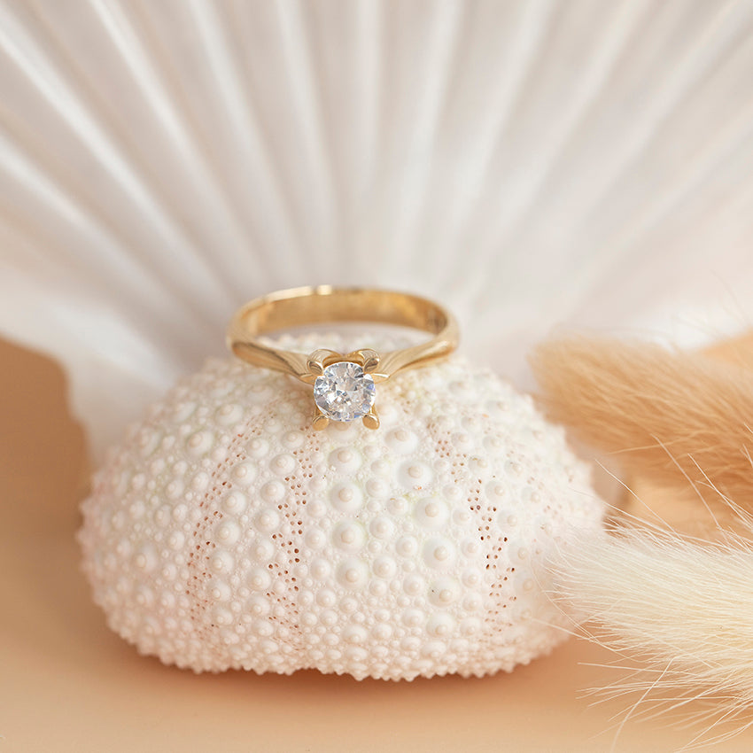 Gouden solitair ring met zirkonia 14 karaat