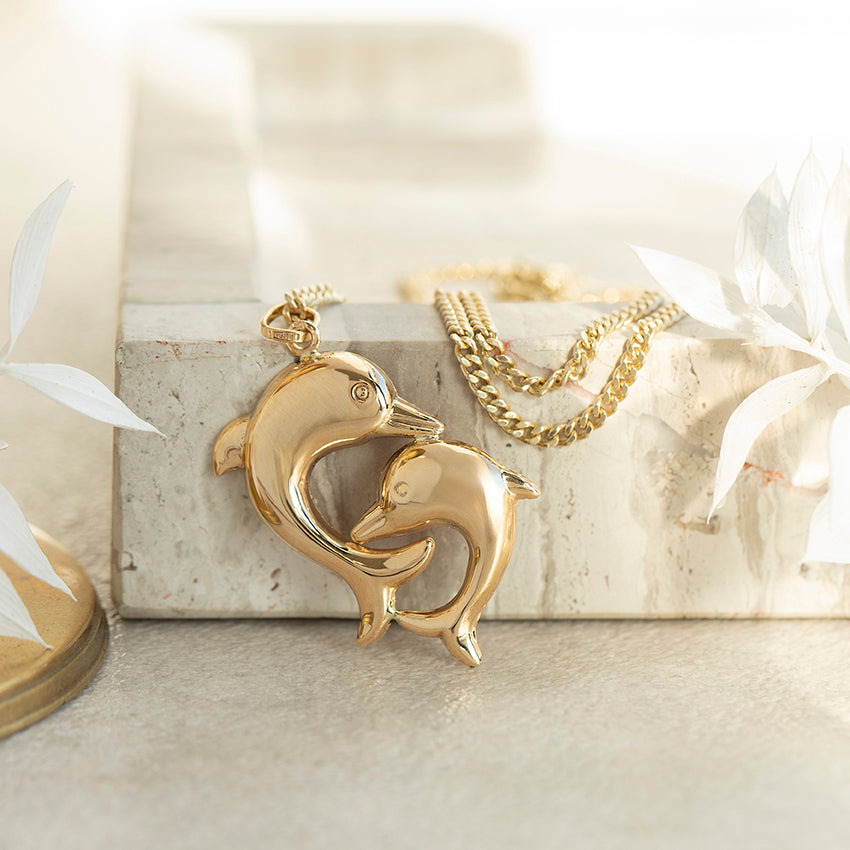 Gouden hanger met dolfijnen 18 karaat