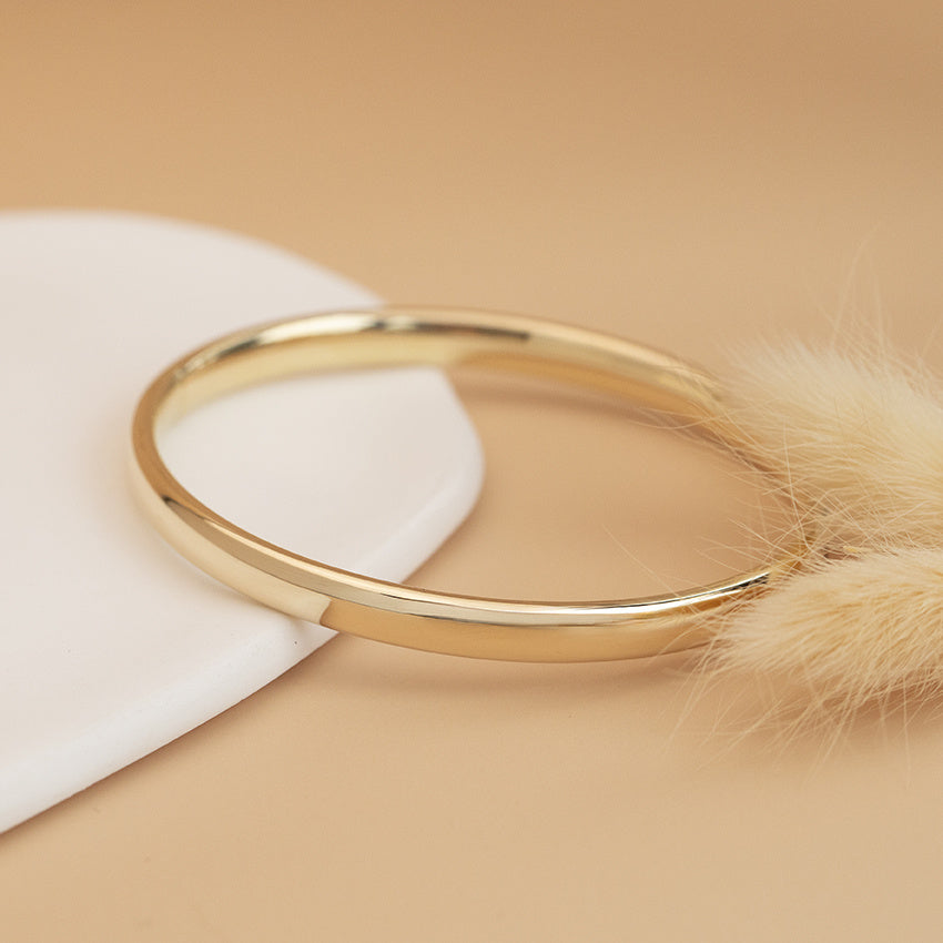 Gouden gladde bangle 14 karaat
