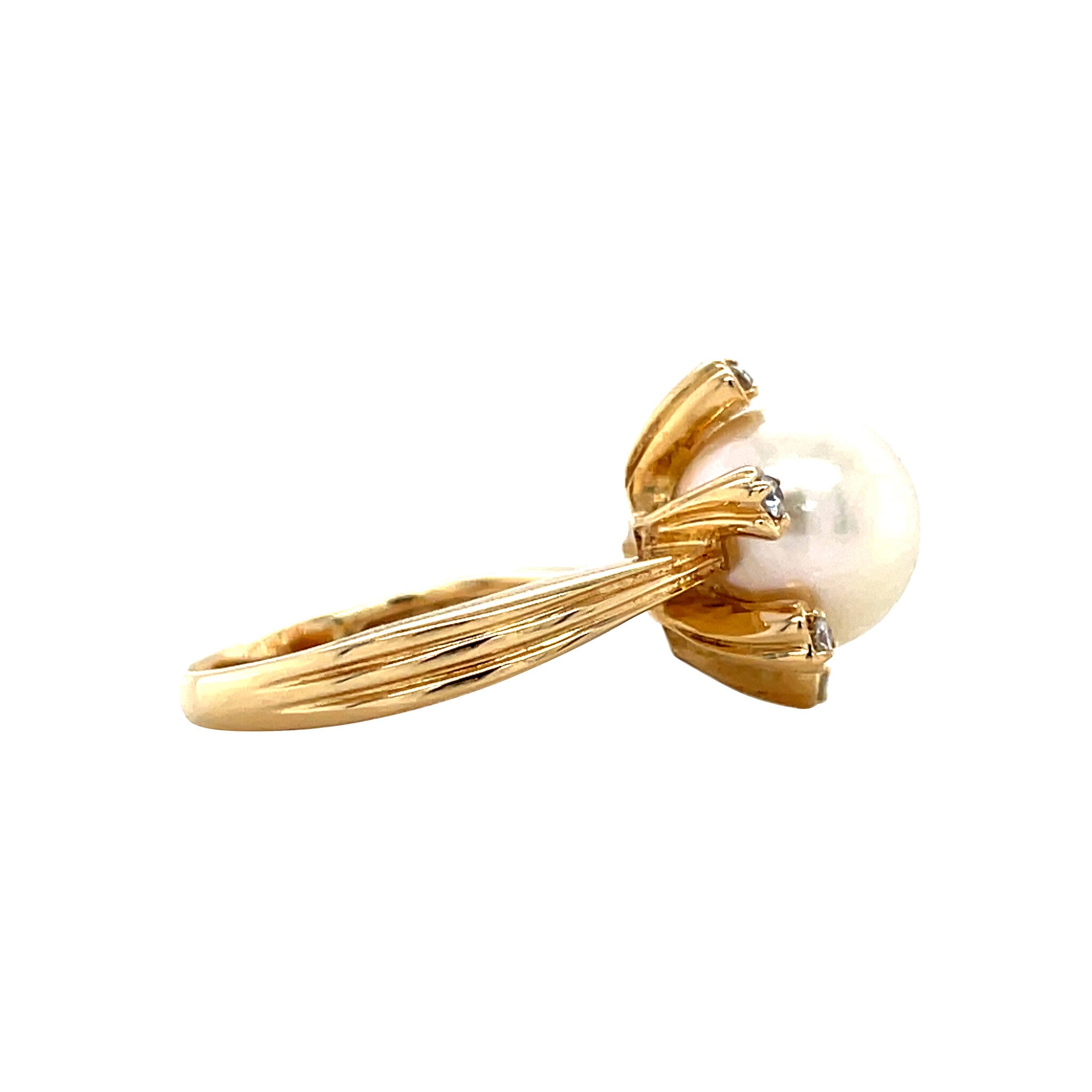 Gold entourage ring with pearl and diamond 18 karat