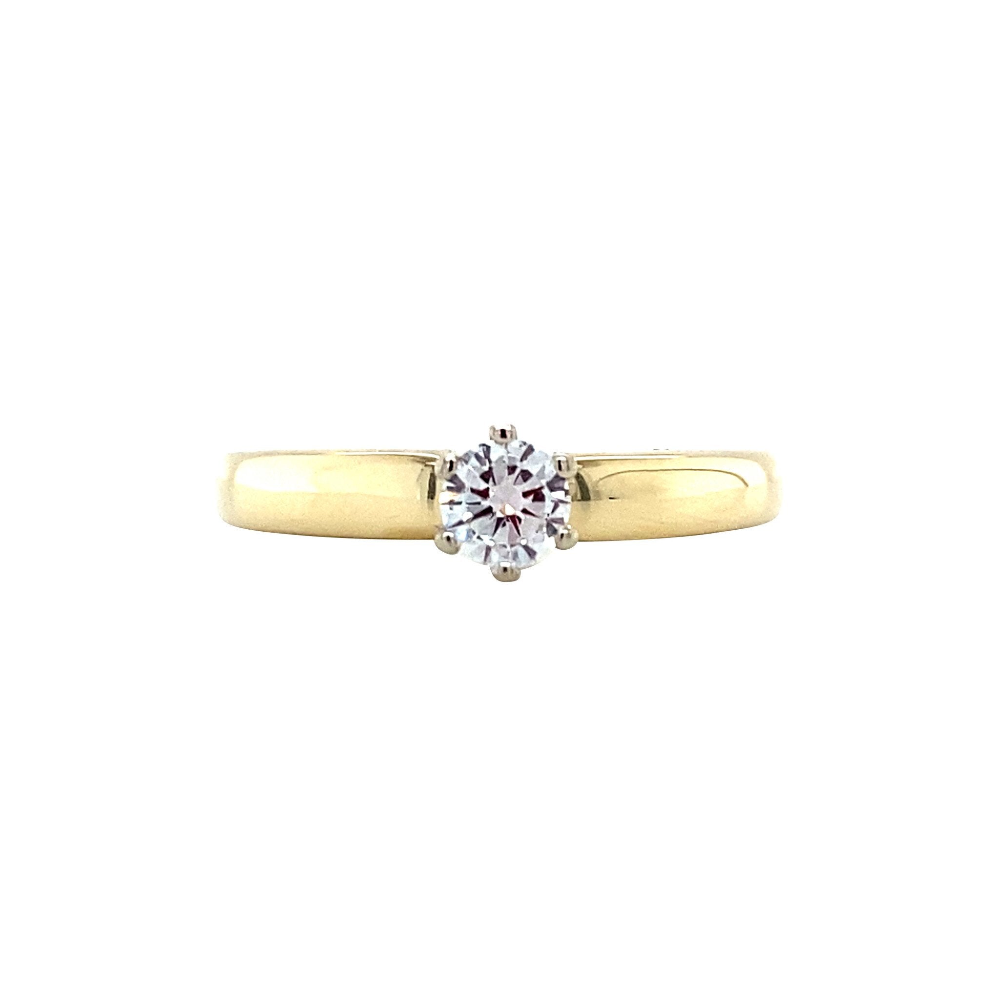 Gold solitaire ring with diamond 14 karat