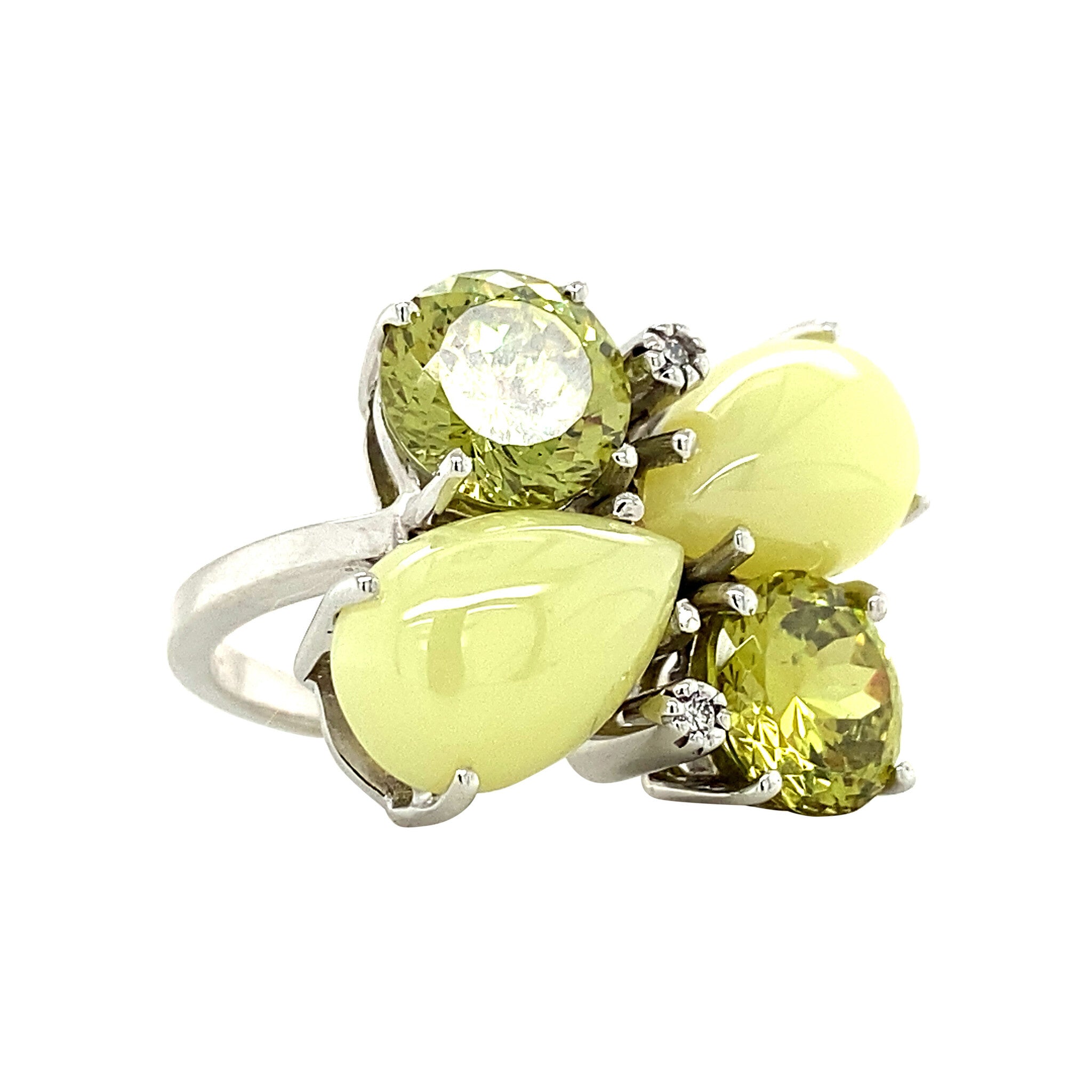 White gold ring with green gemstone and diamond 18 kt