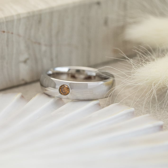 White gold smooth ring with orange/brown diamond 14 karat