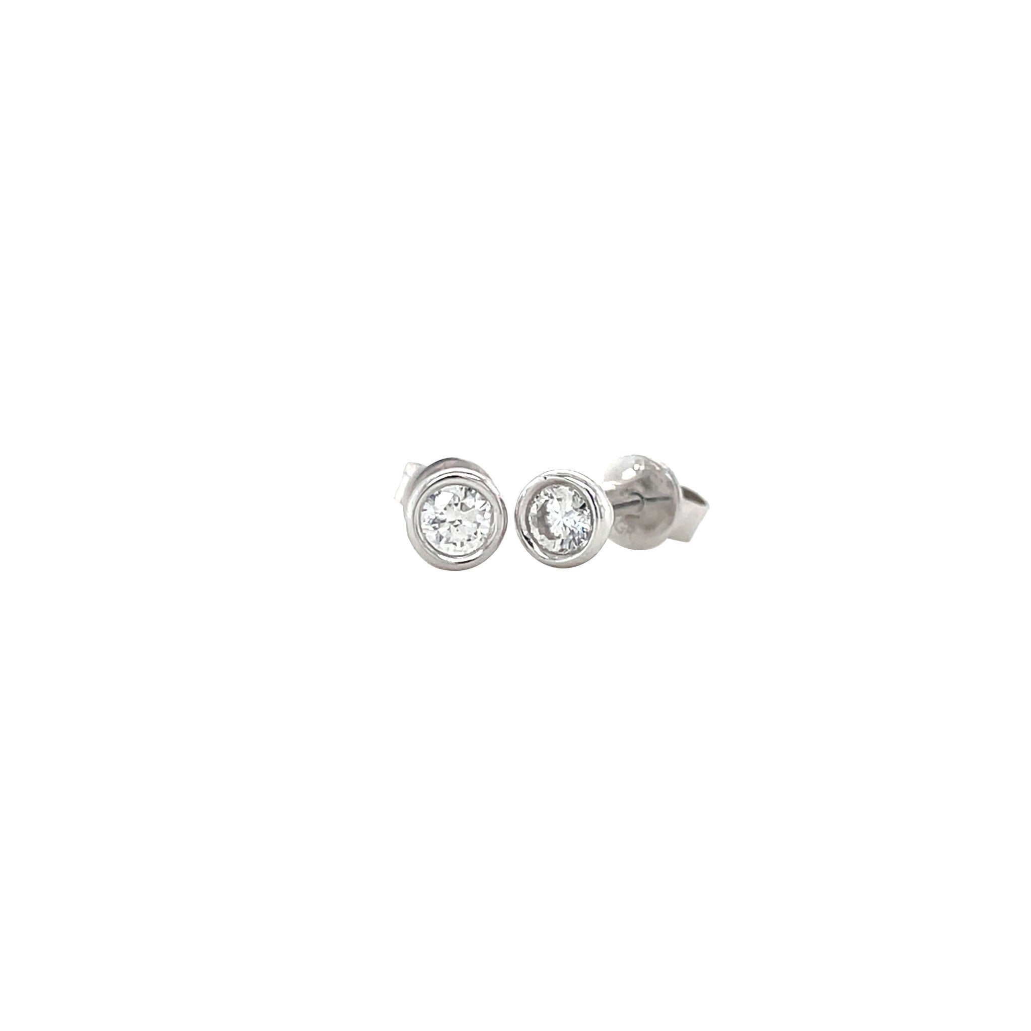 White gold solitaire stud earrings with diamond 14 kt