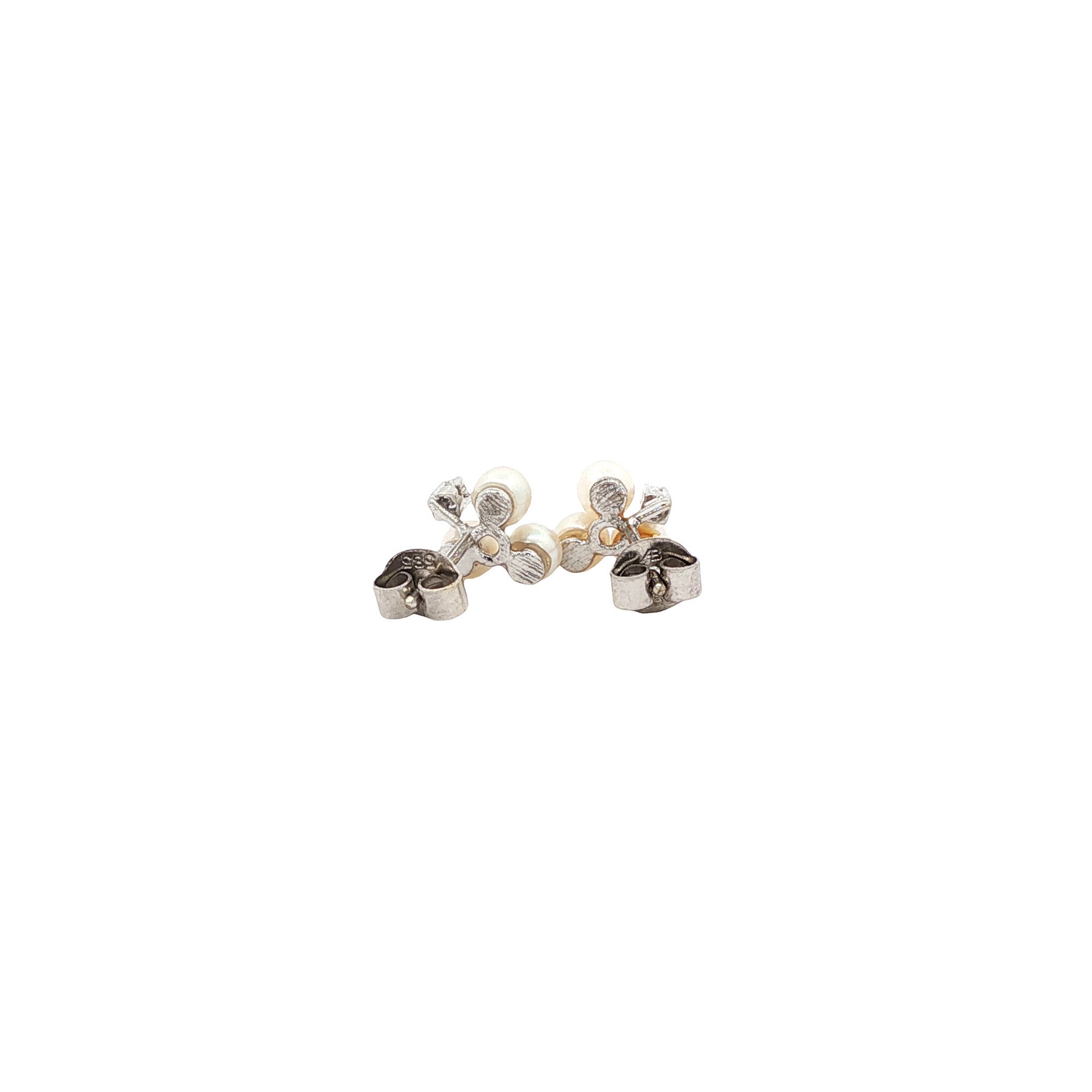 14 karat white gold stud earrings with pearl and diamond