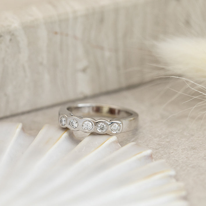 White gold row ring with diamond 18 karat