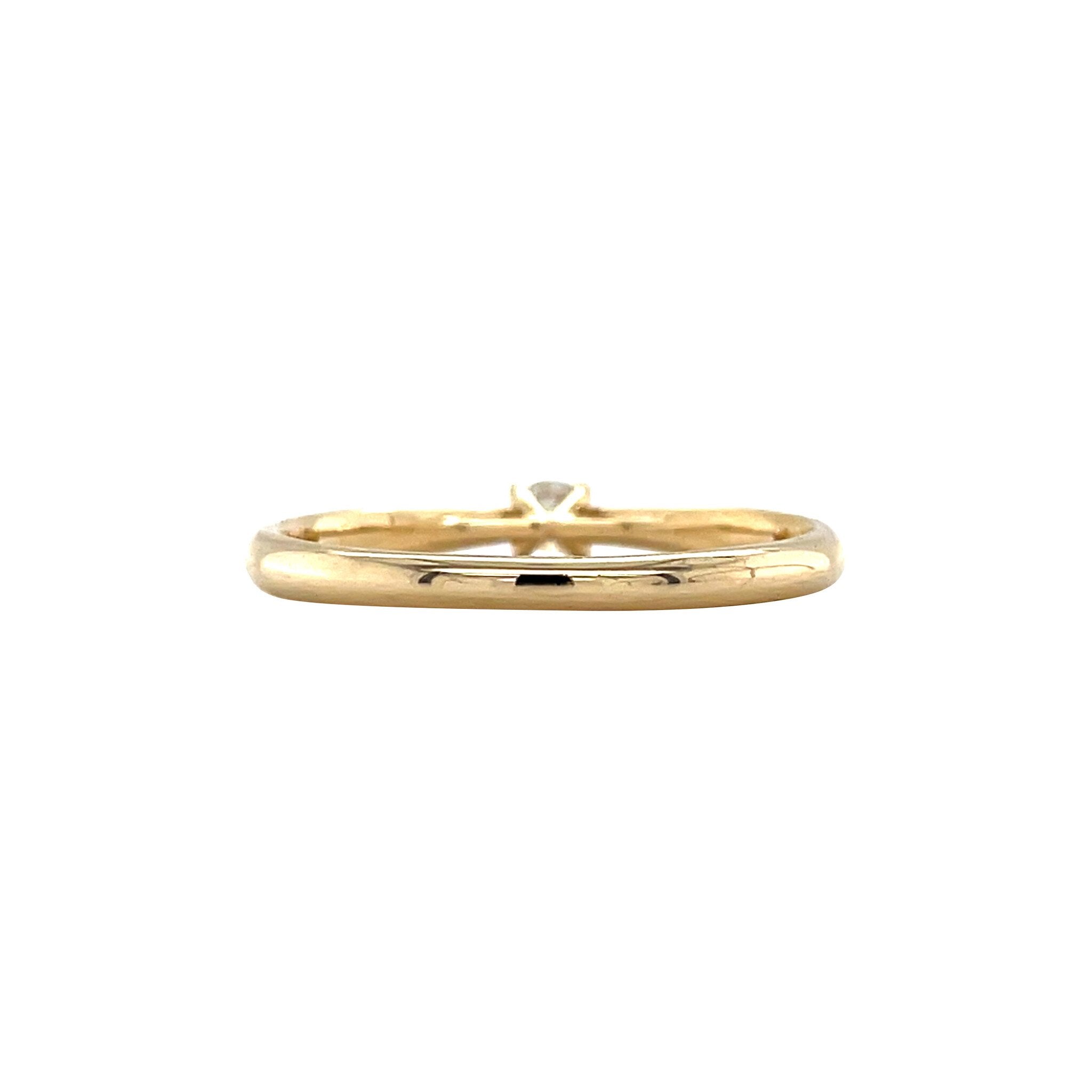 Gold solitaire ring with diamond 14 kt