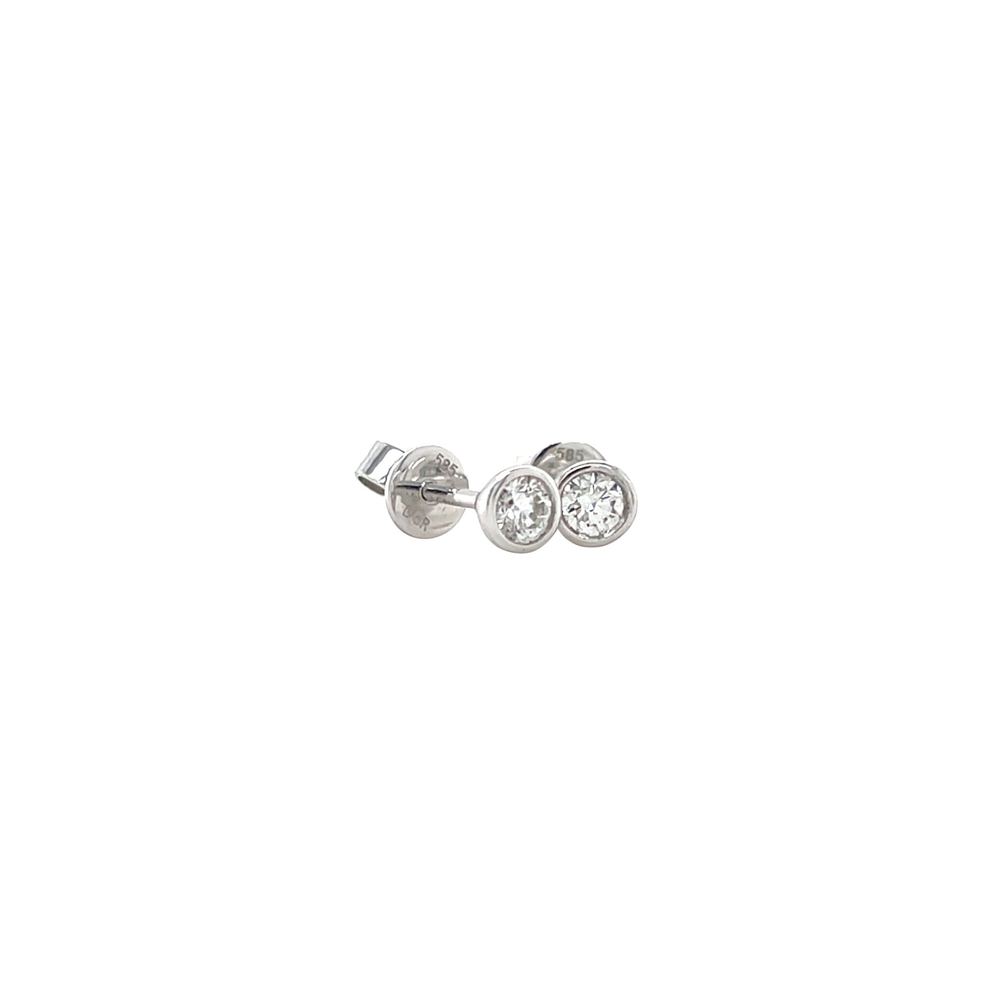 White gold solitaire stud earrings with diamond 14 kt
