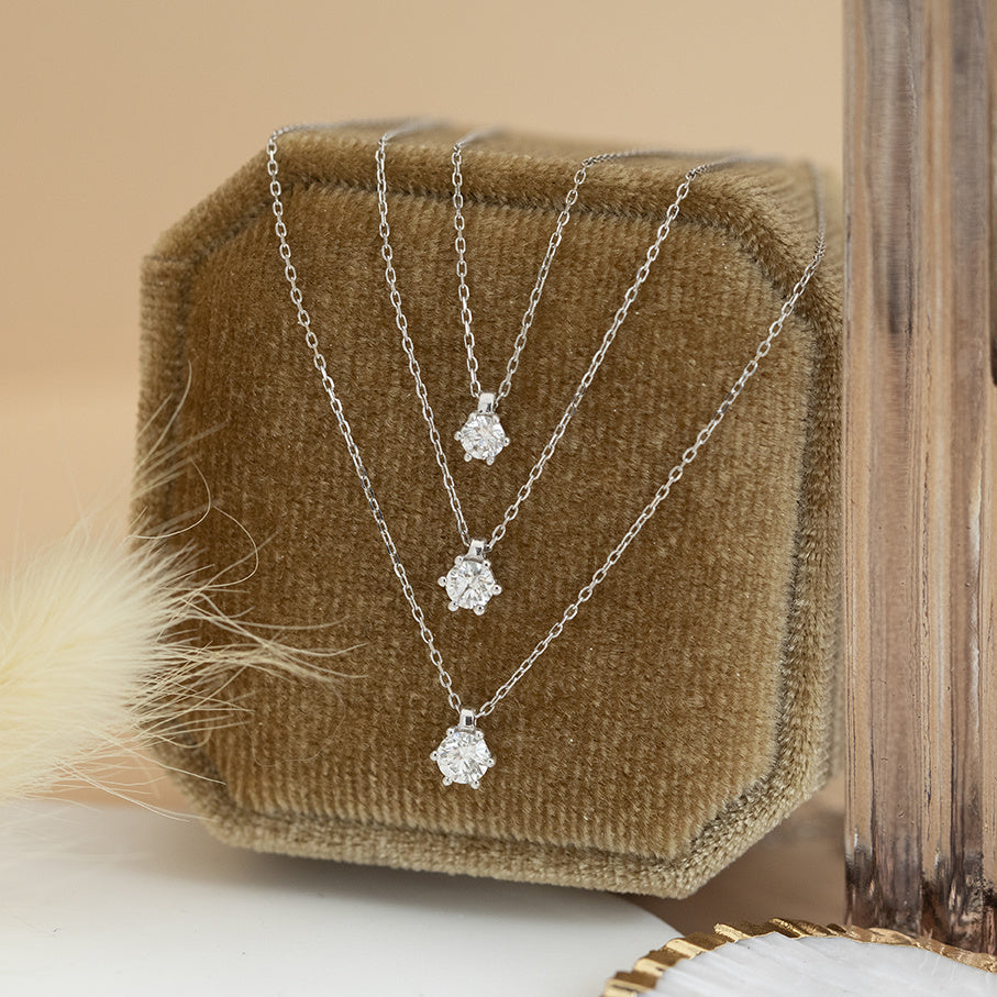 Gouden solitair collier met diamant 14 krt