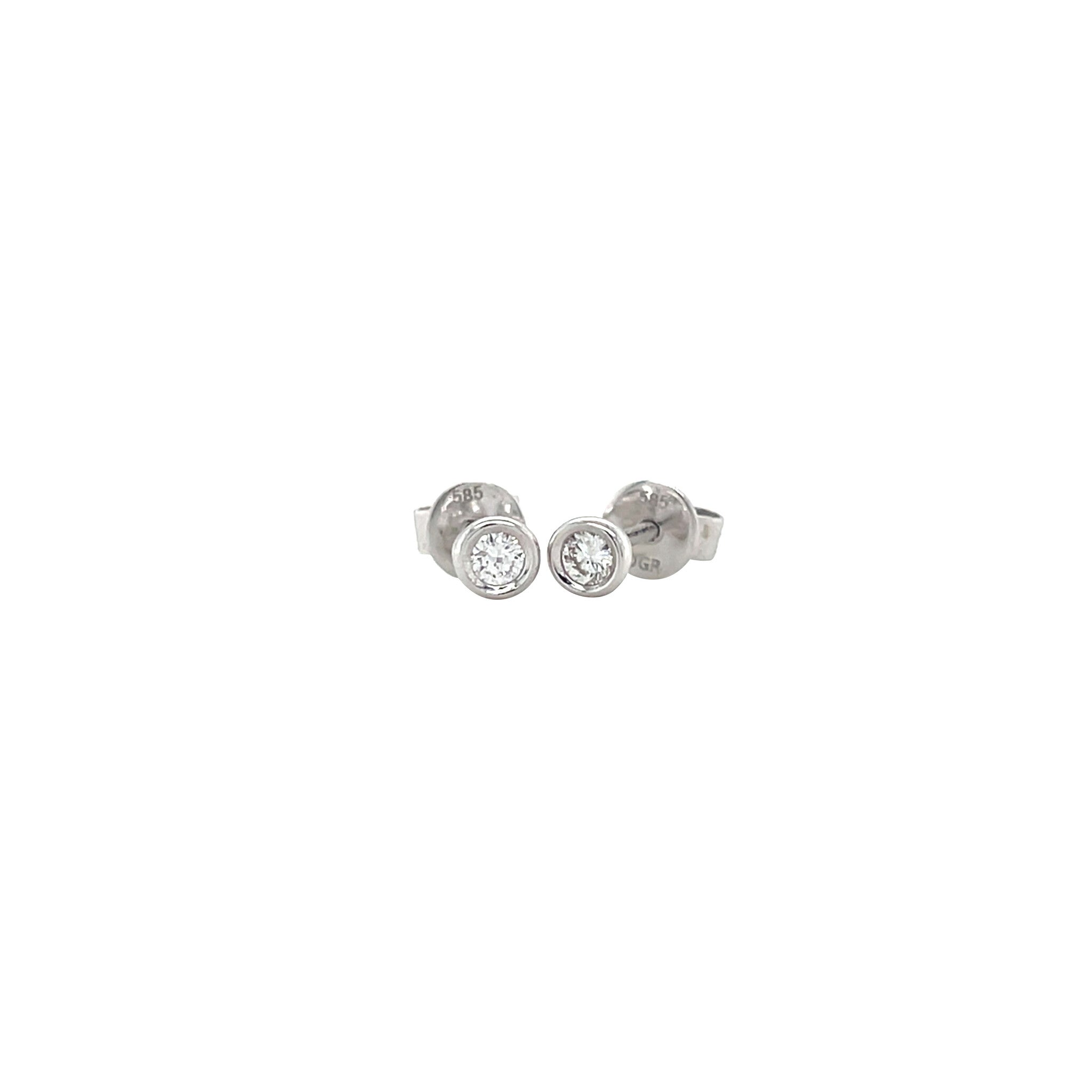 White gold solitaire stud earrings 14 kt