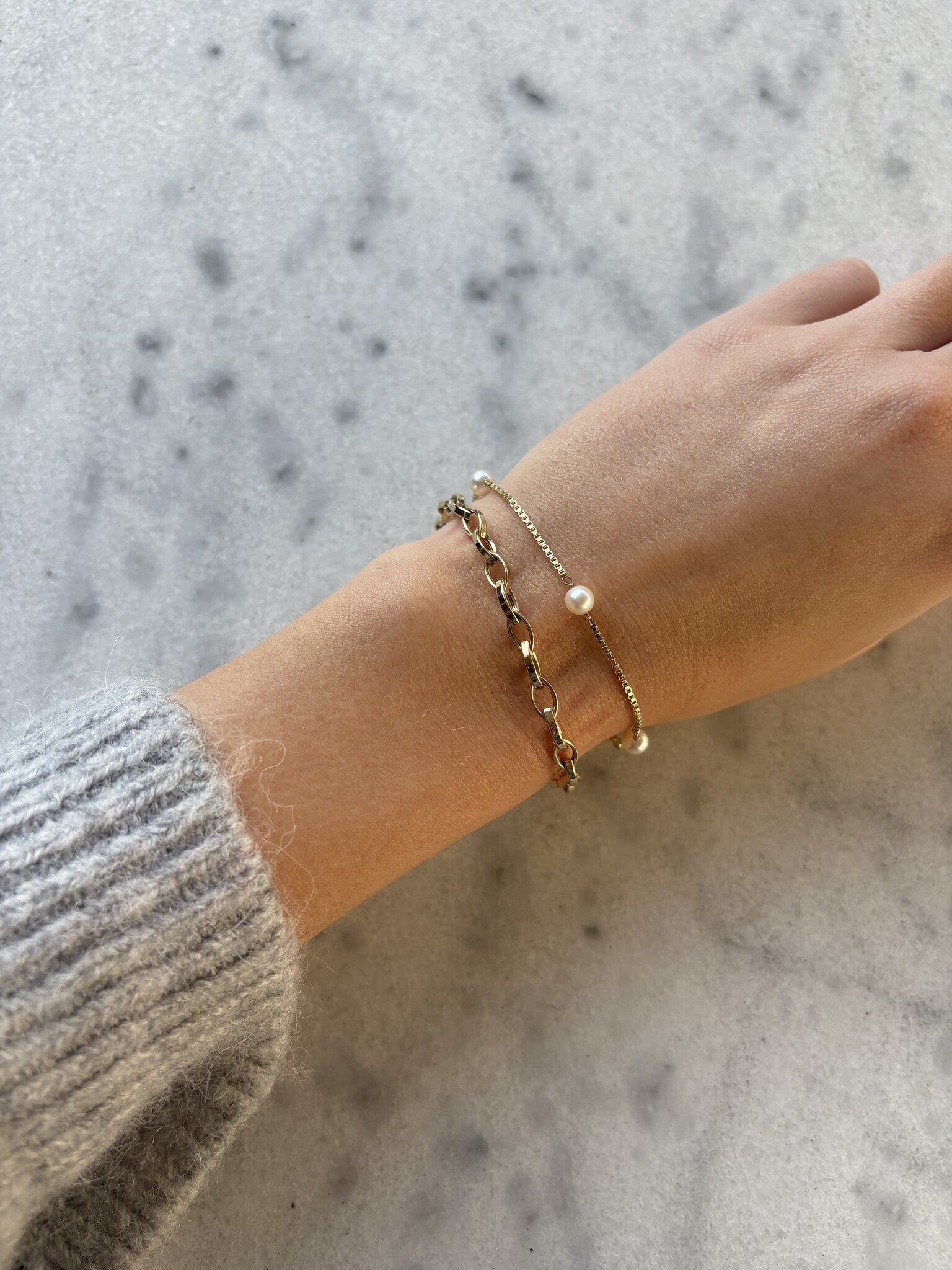 Gouden armband met parels 14 karaat