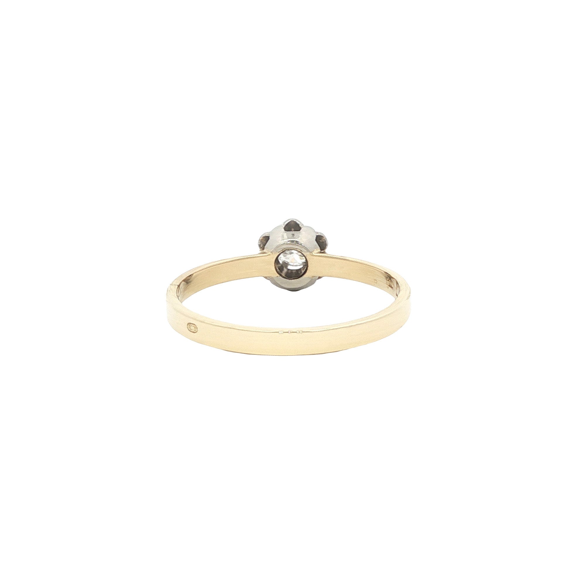 14 karat gold solitaire ring with a diamond