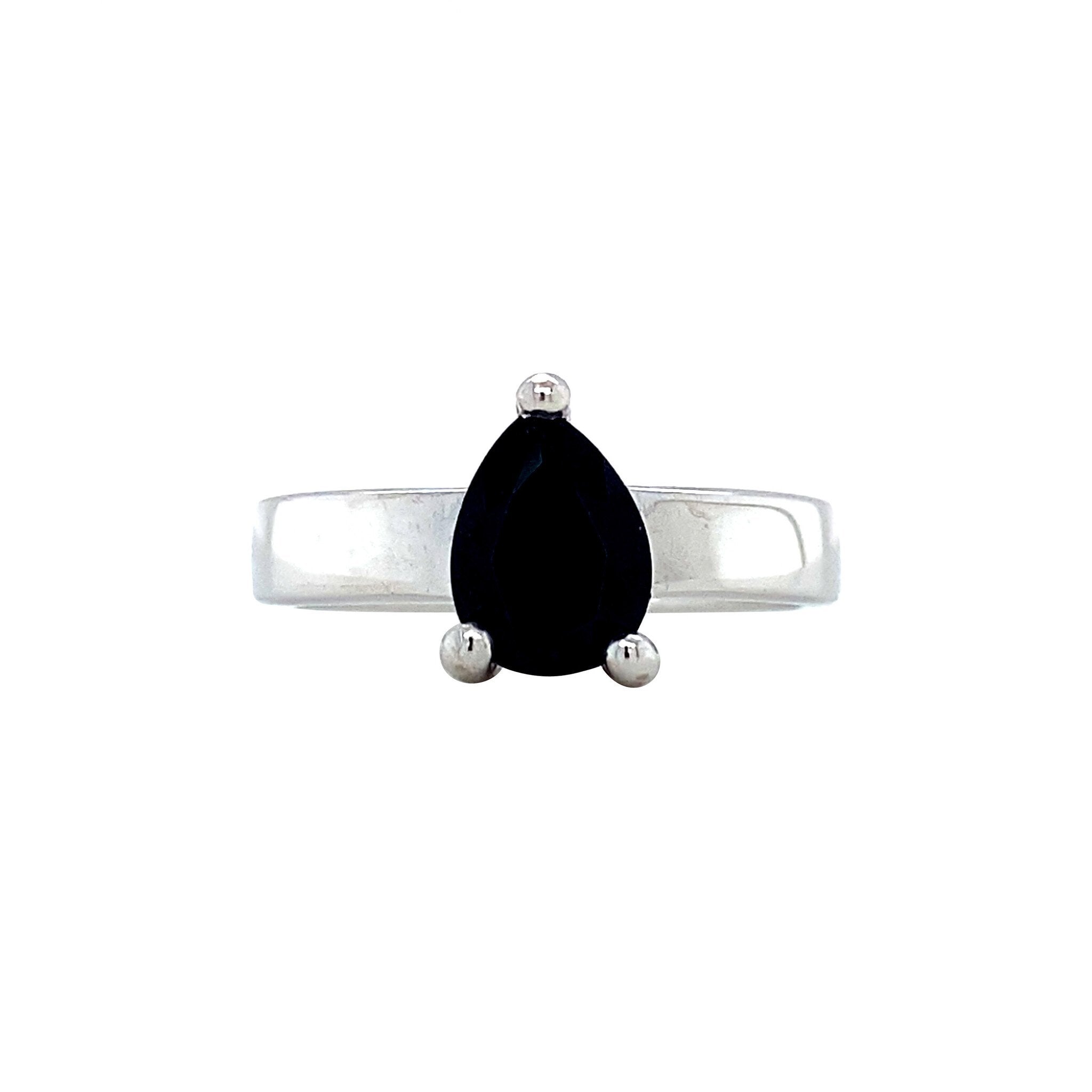 White gold ring with blue sapphire 18 karat