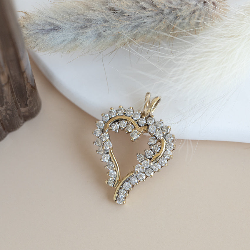 Golden heart pendant with diamond 18 kt