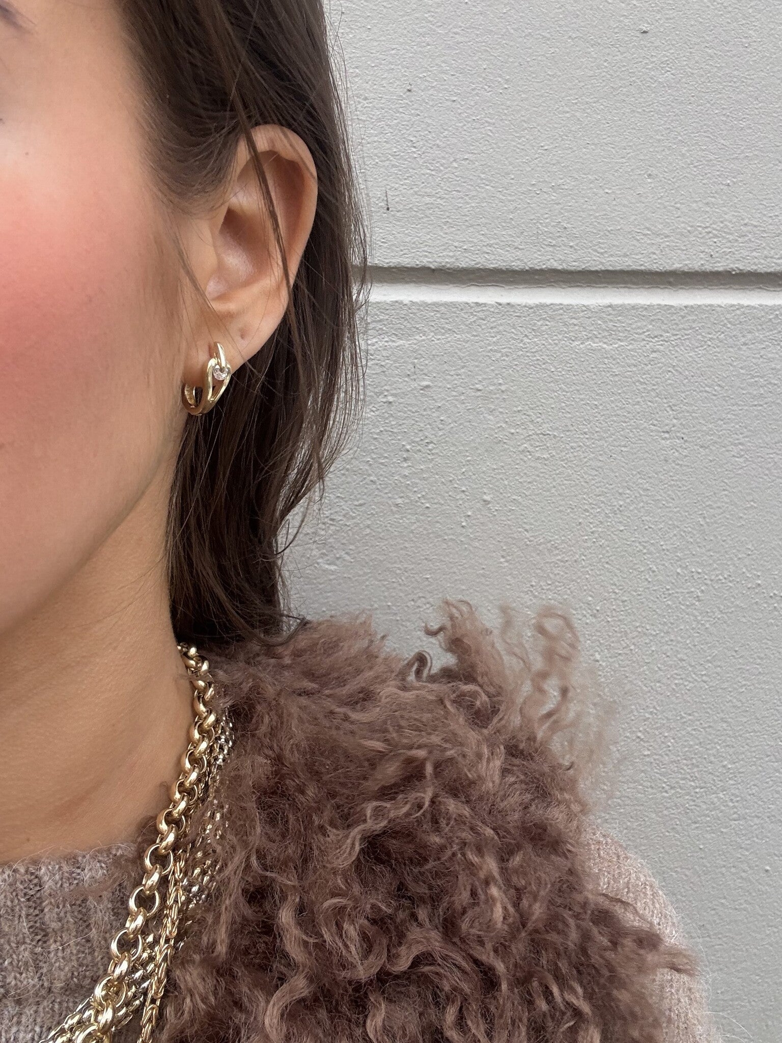 14 karat gold ear jewelry with zirconia