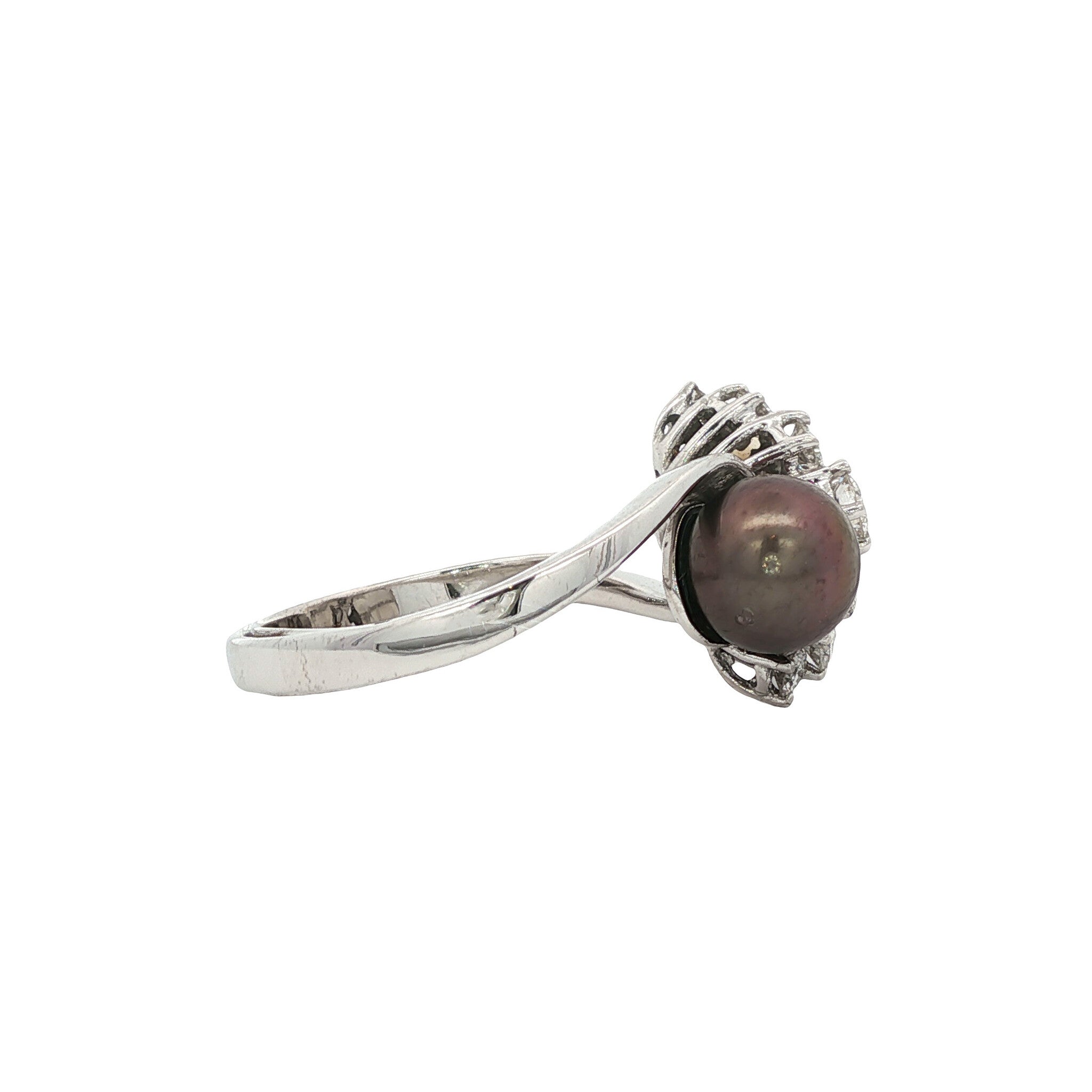 14-karat white gold ring with a diamond and pearls