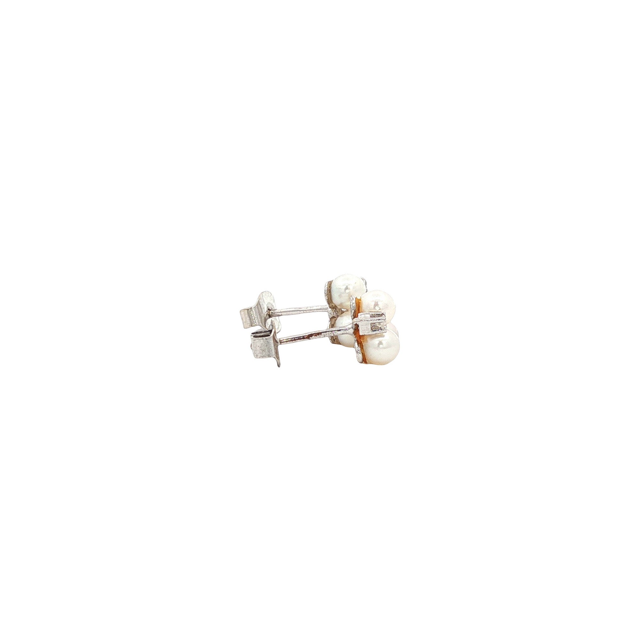 14 karat white gold stud earrings with pearl and diamond