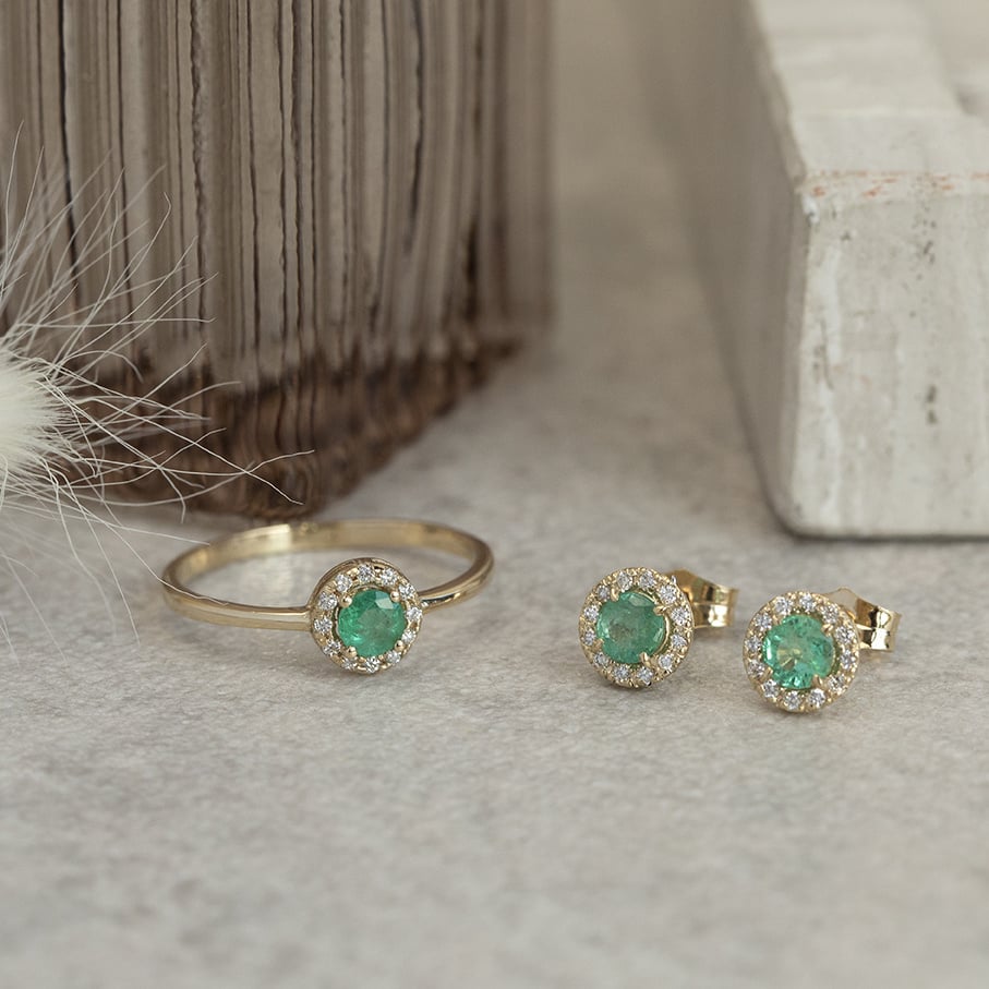 Gouden entourage ring met smaragd en diamant 14 karaat* nieuw