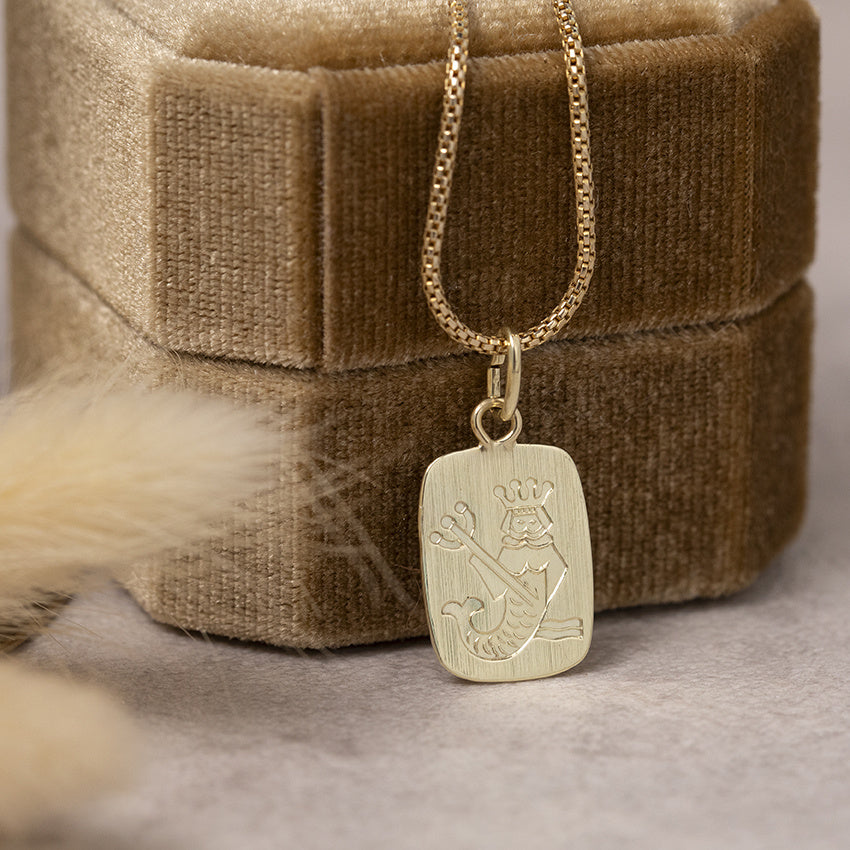 Gold Aquarius pendant 14 karat