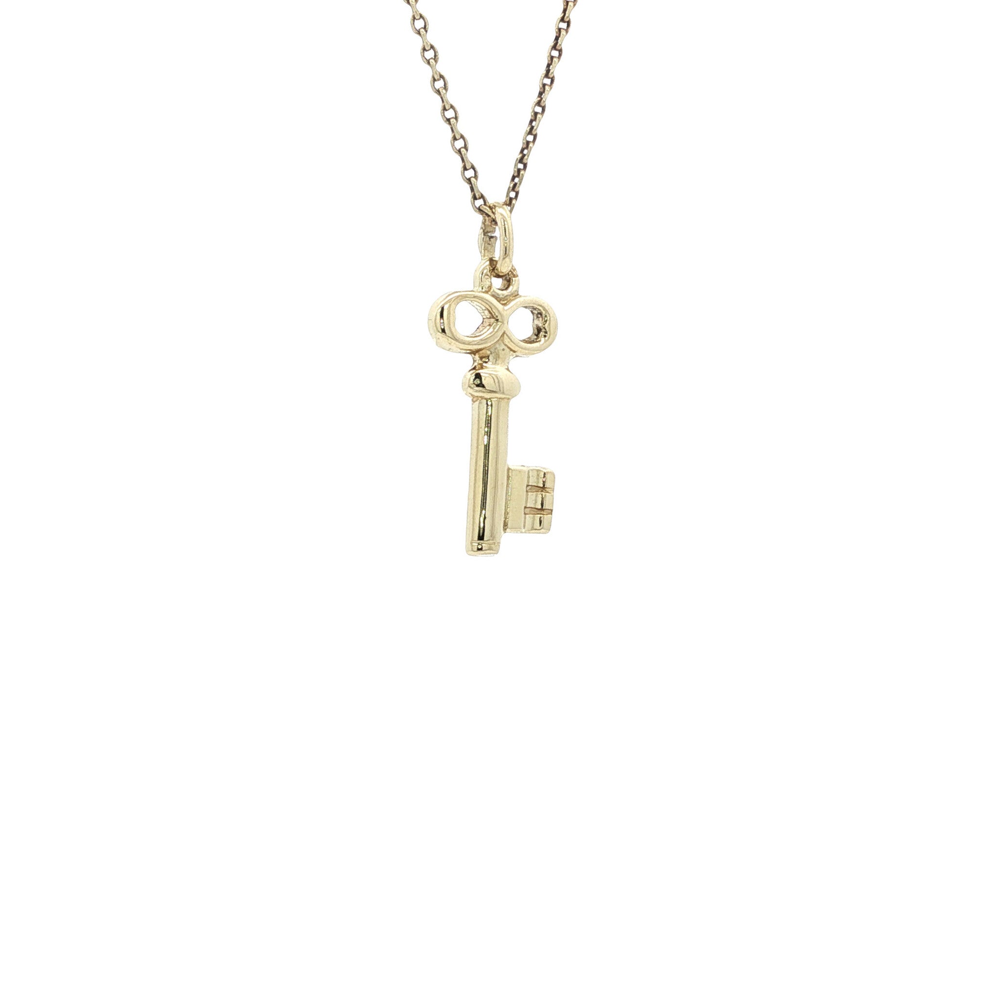 Gold key pendant 14 karat