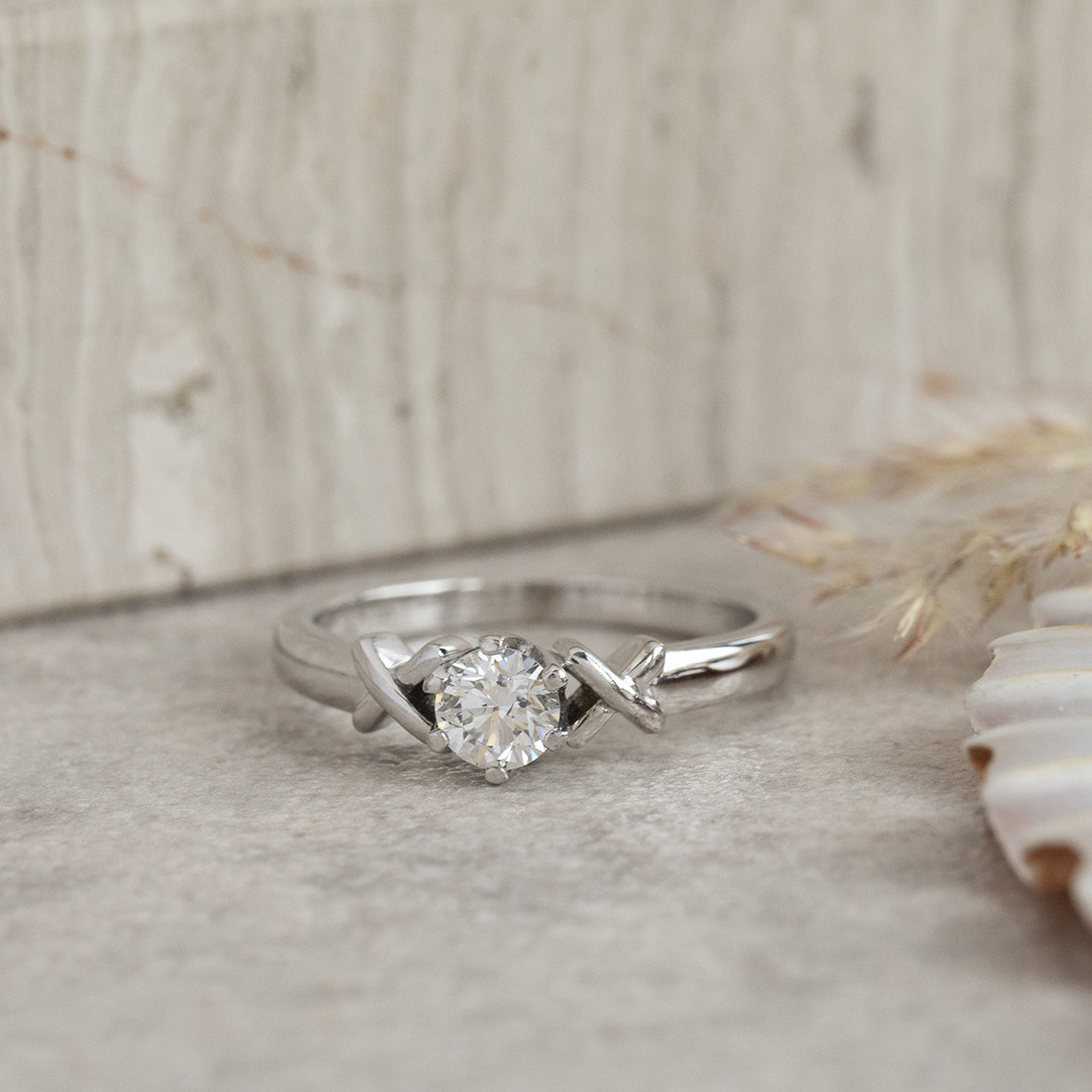 18 karat white gold ring with diamond