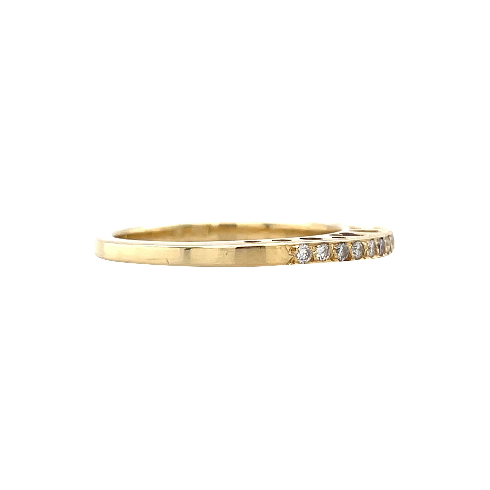 Gold row ring with diamond 18 karat