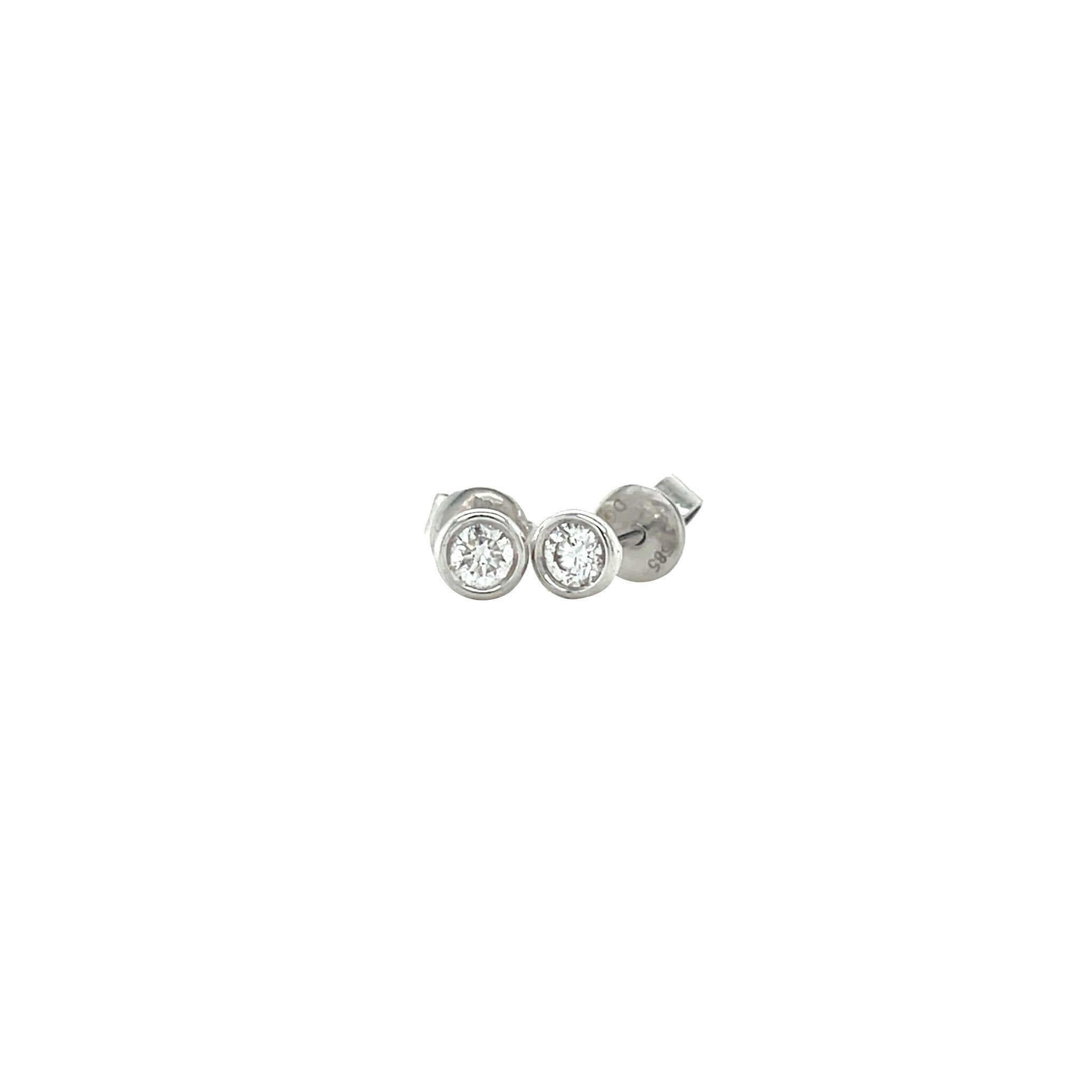 White gold solitaire stud earrings with diamond 14 kt