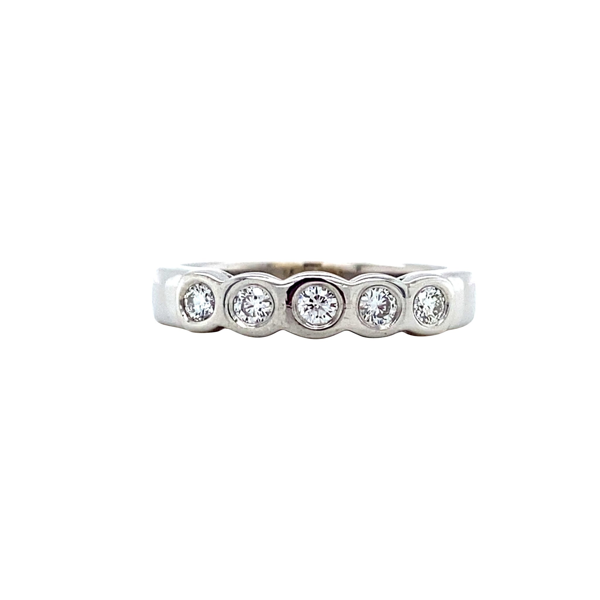 White gold row ring with diamond 18 karat