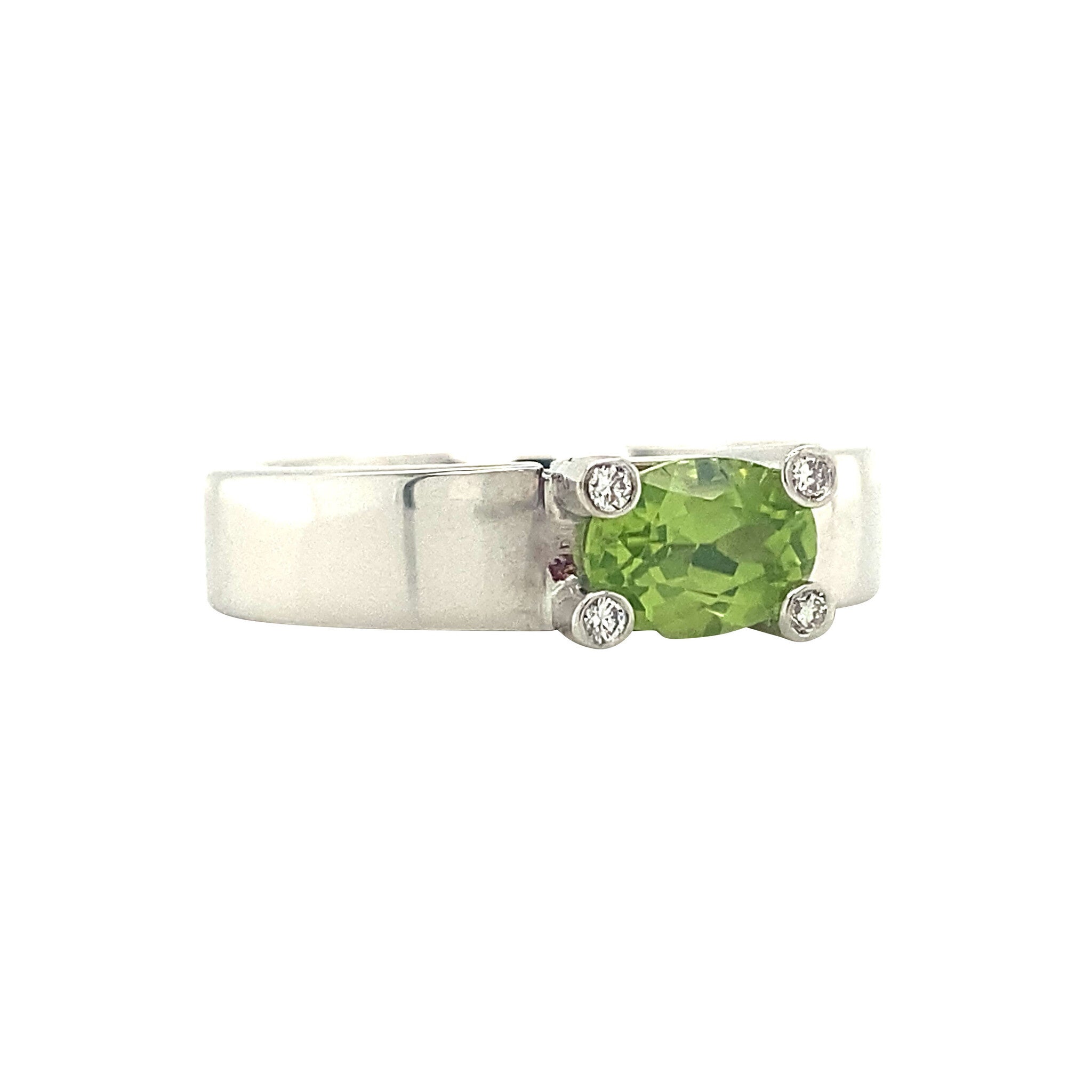 White gold ring with peridot and diamond 14 karat