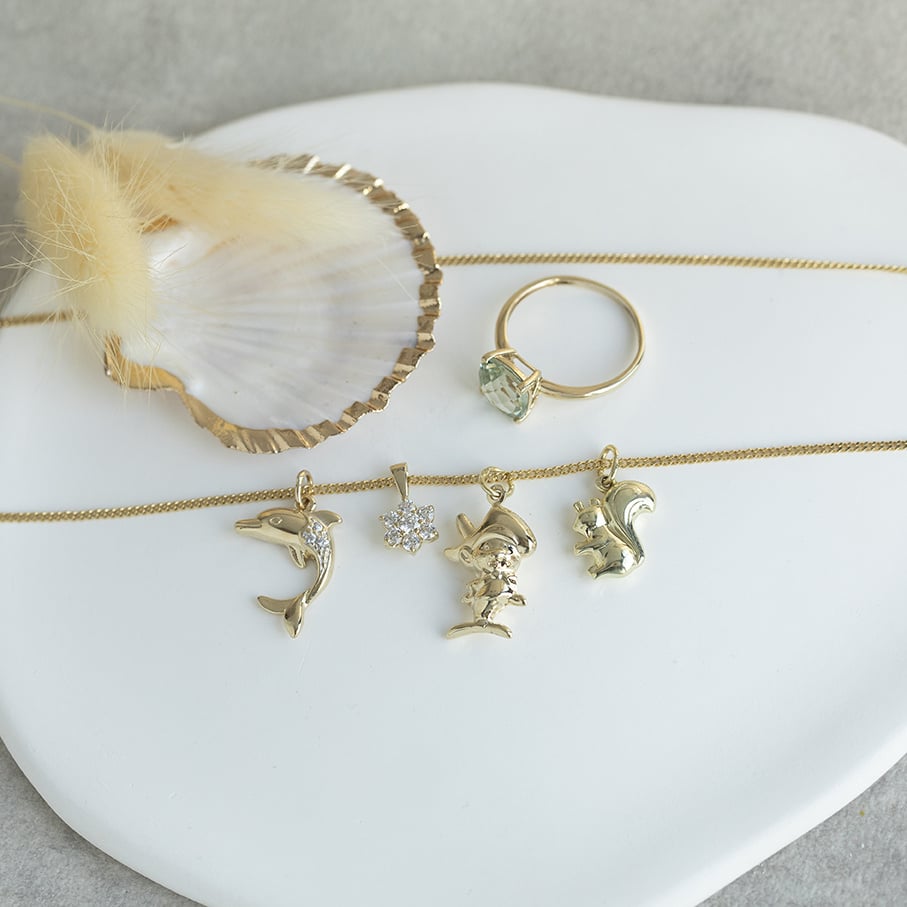 Gold dolphin pendant 14 karat