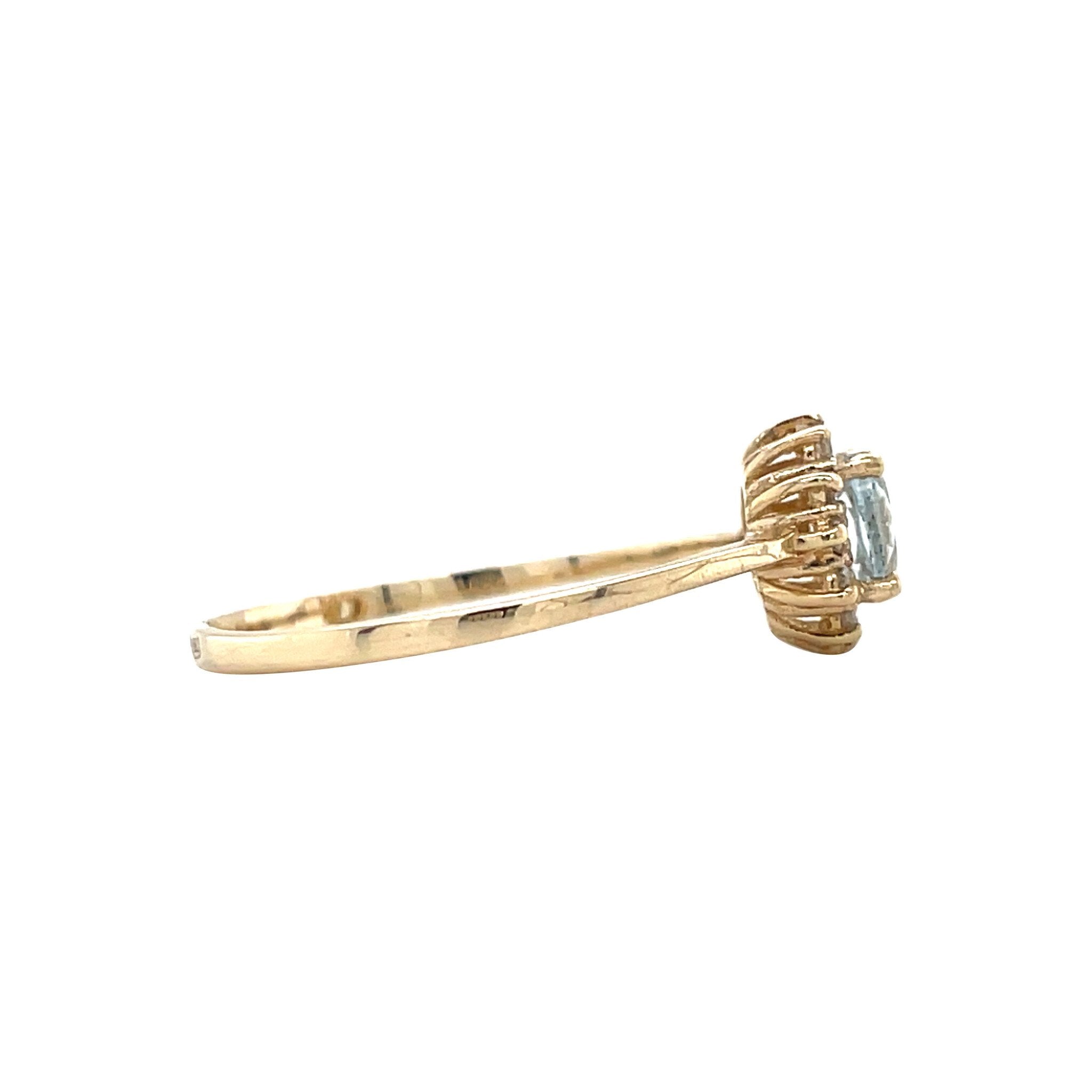 Gouden entourage ring met topaas en diamant 14 karaat* nieuw