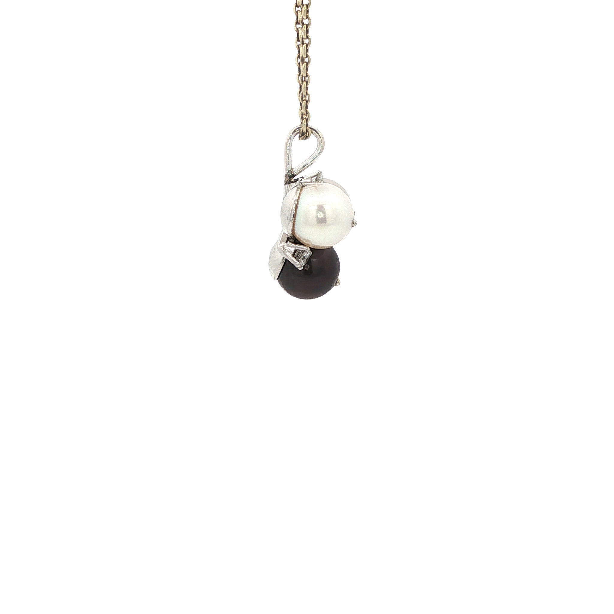 Witgouden hanger met parel en diamant 14 karaat