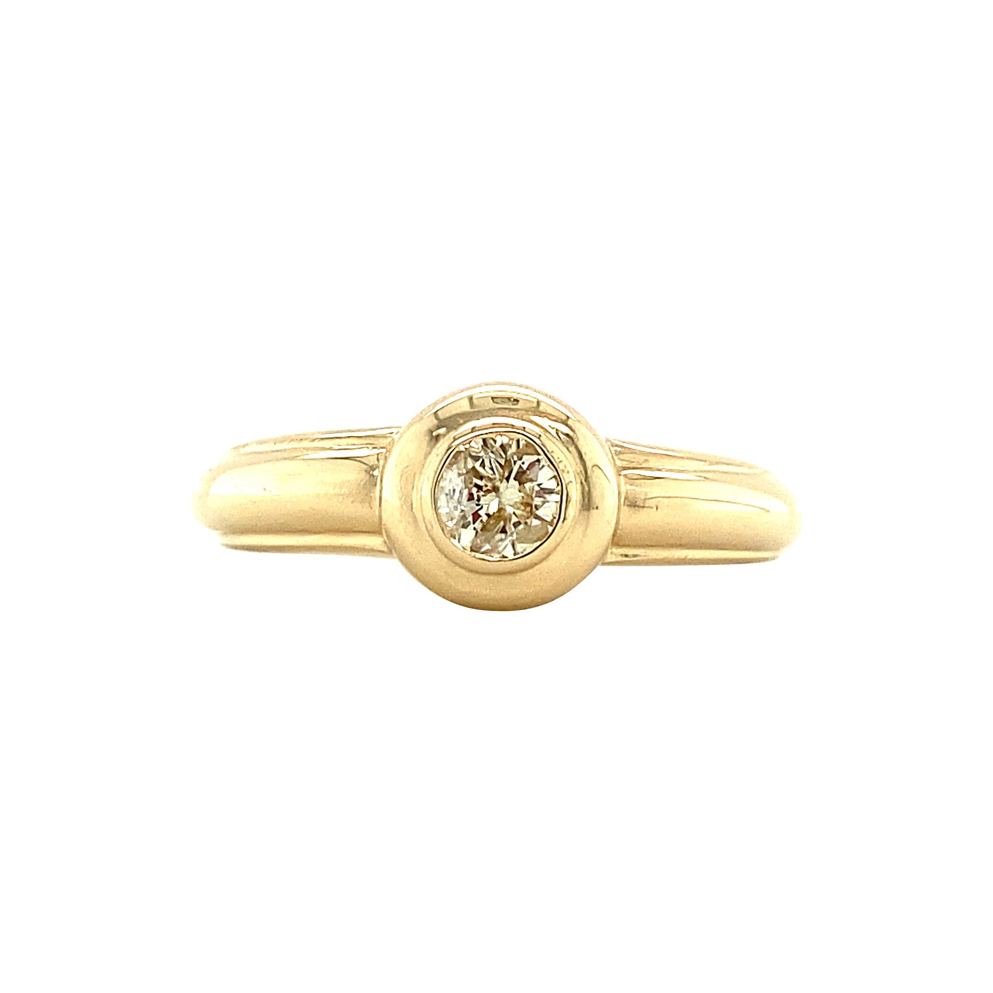 14 kt gold solitaire ring with diamond