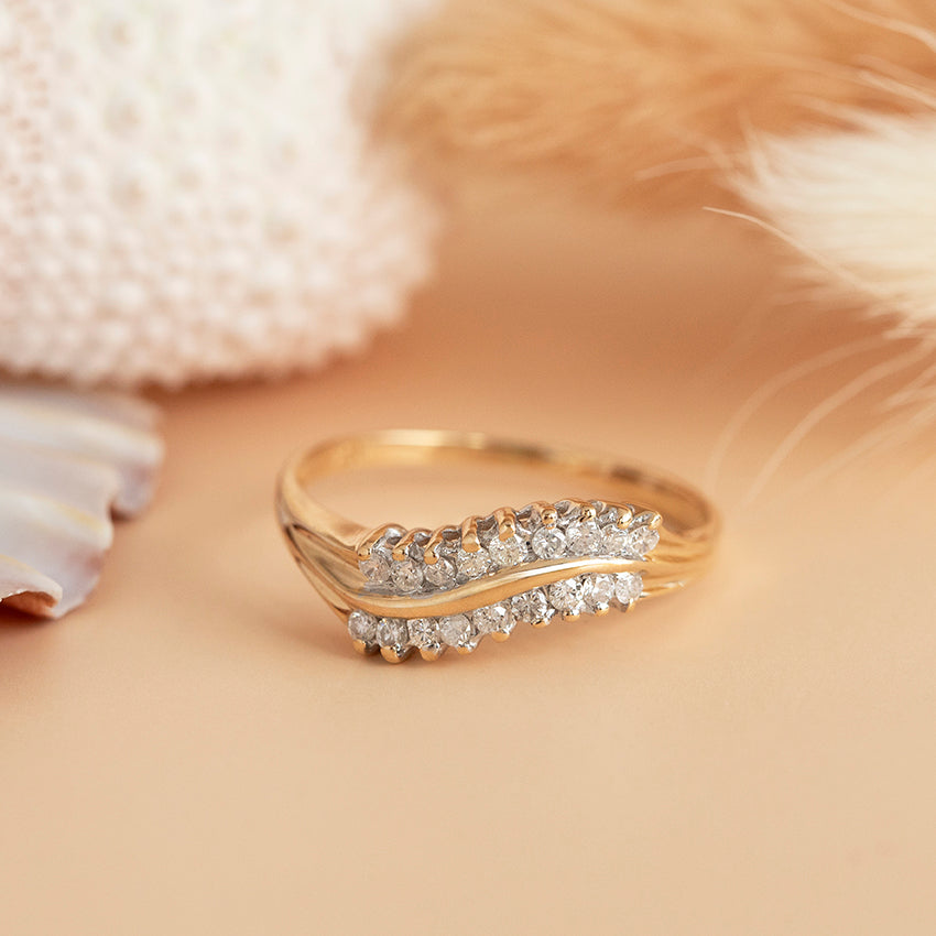 Gouden slagring met diamant 18 karaat