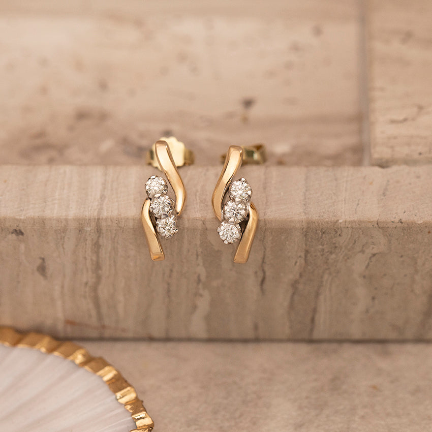 14 karat gold diamond stud earrings