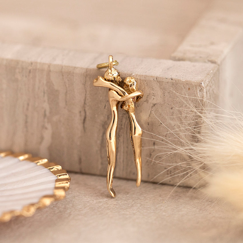 Goudenhanger omhelzend koppel 14 karaat