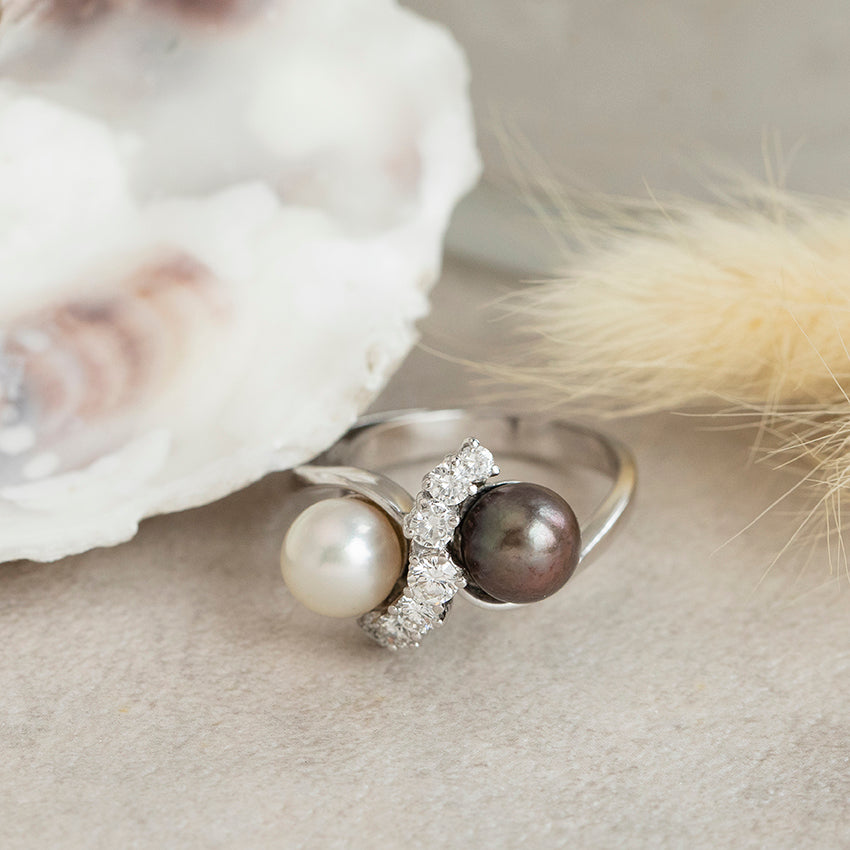 14-karat white gold ring with a diamond and pearls