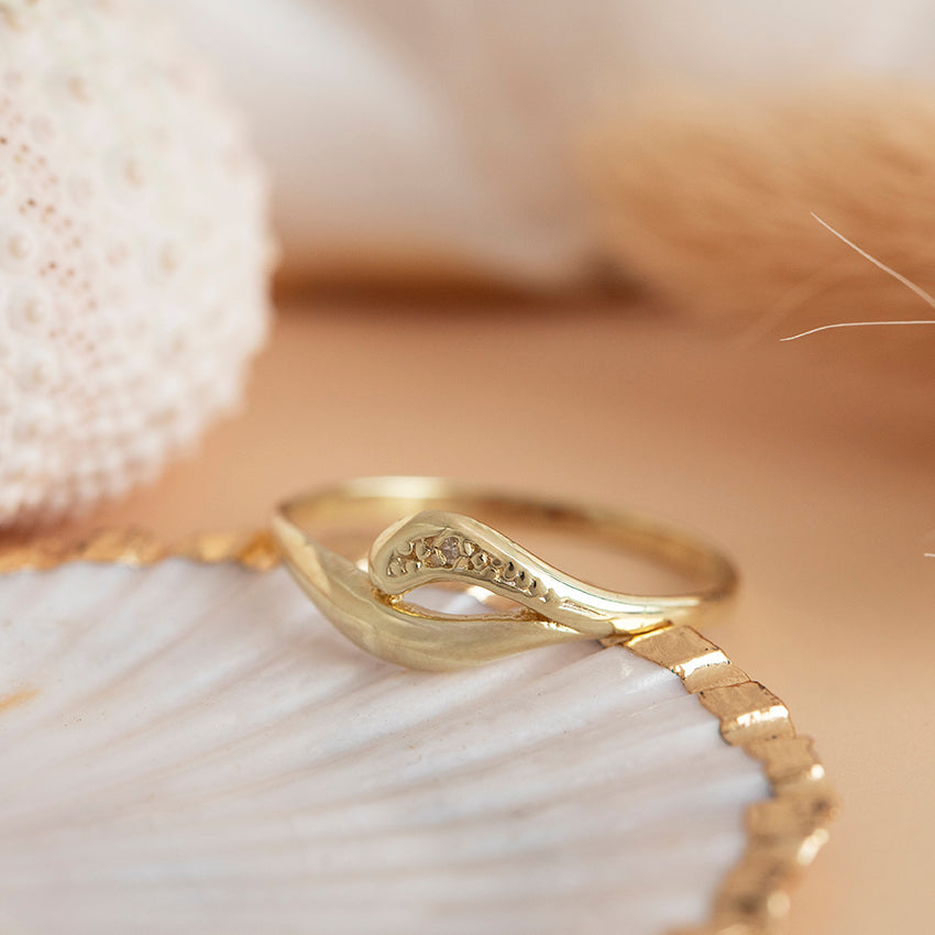 14-karat gold ring with a diamond.
