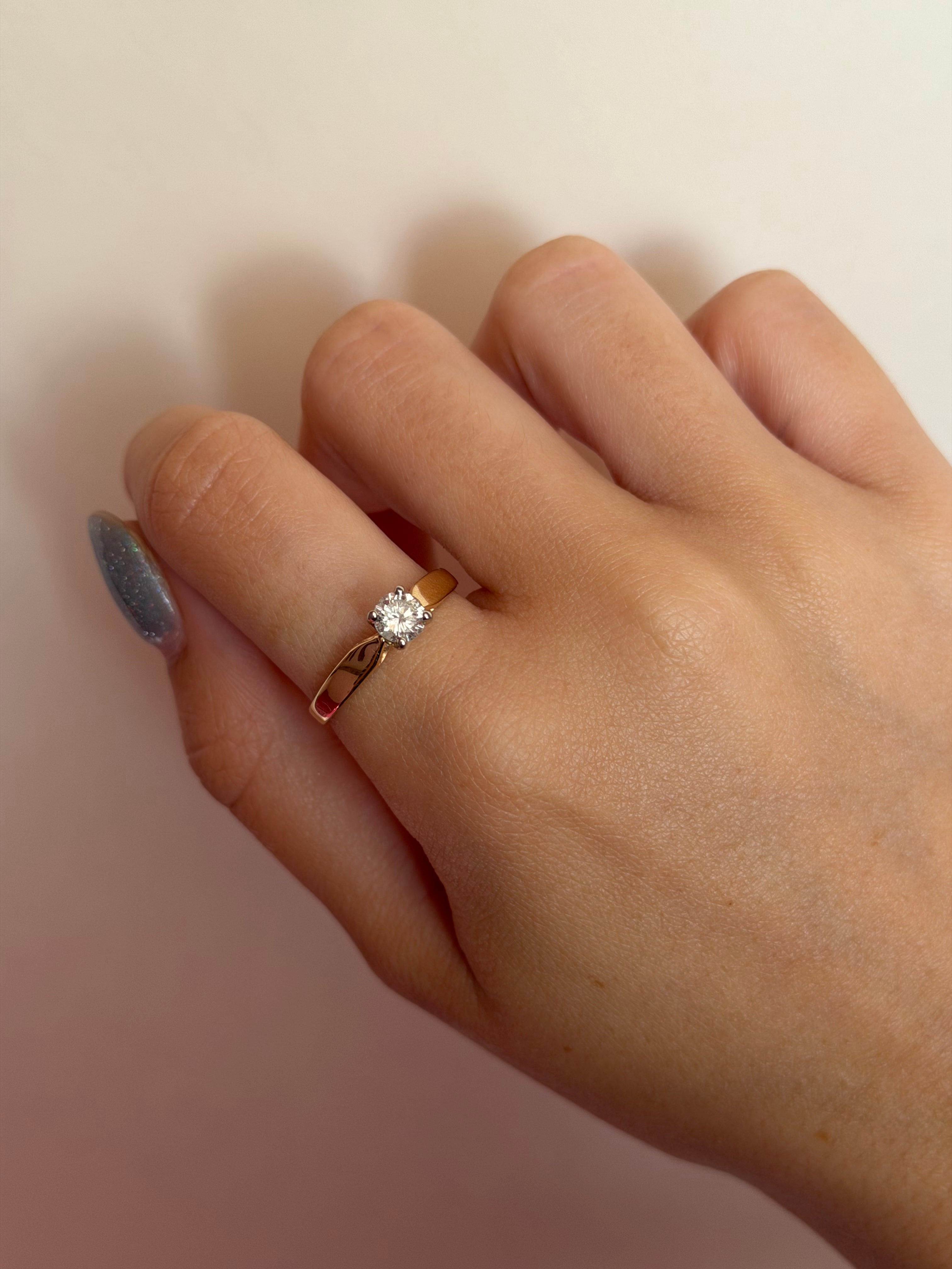 Gouden solitair ring met diamant 14 karaat