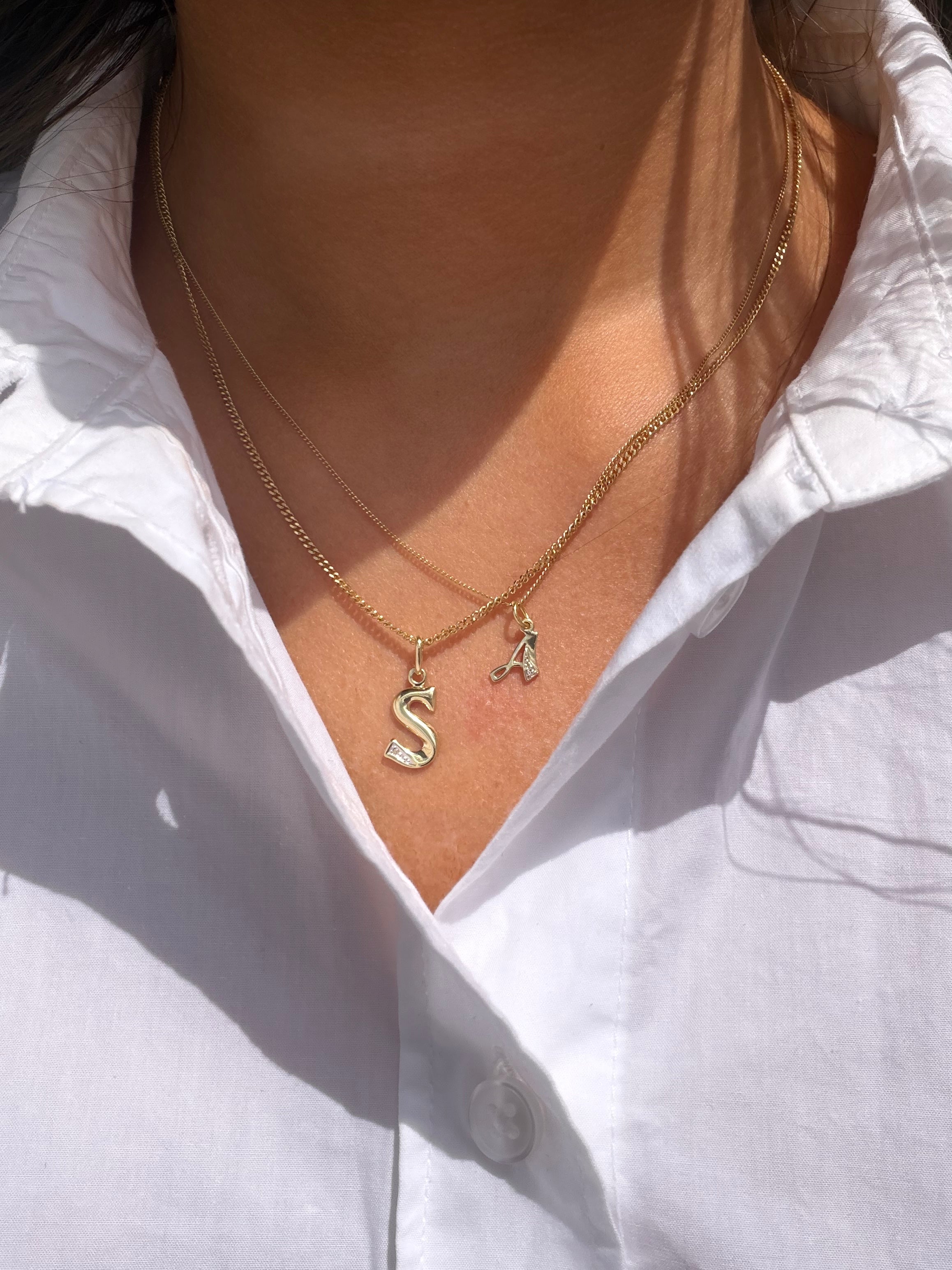 Gouden hanger letter S met diamant 14 karaat