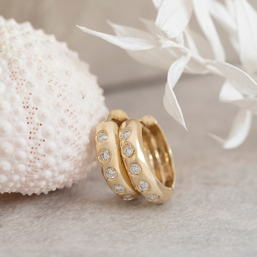 Gouden klapreolen met diamant 14 karaat