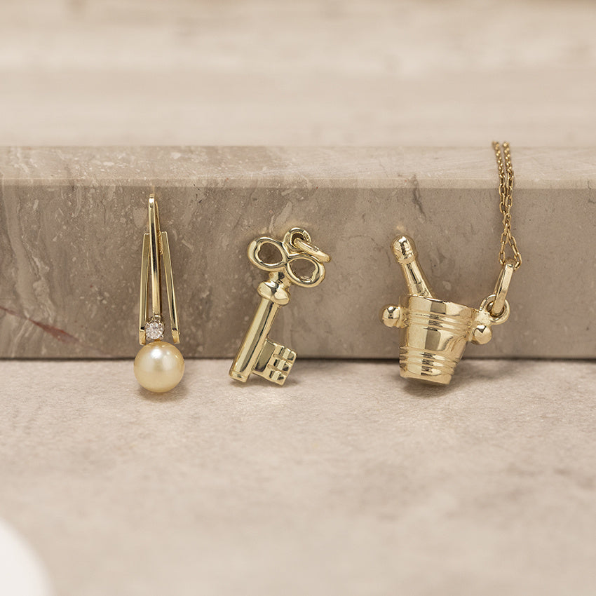 Gold key pendant 14 karat