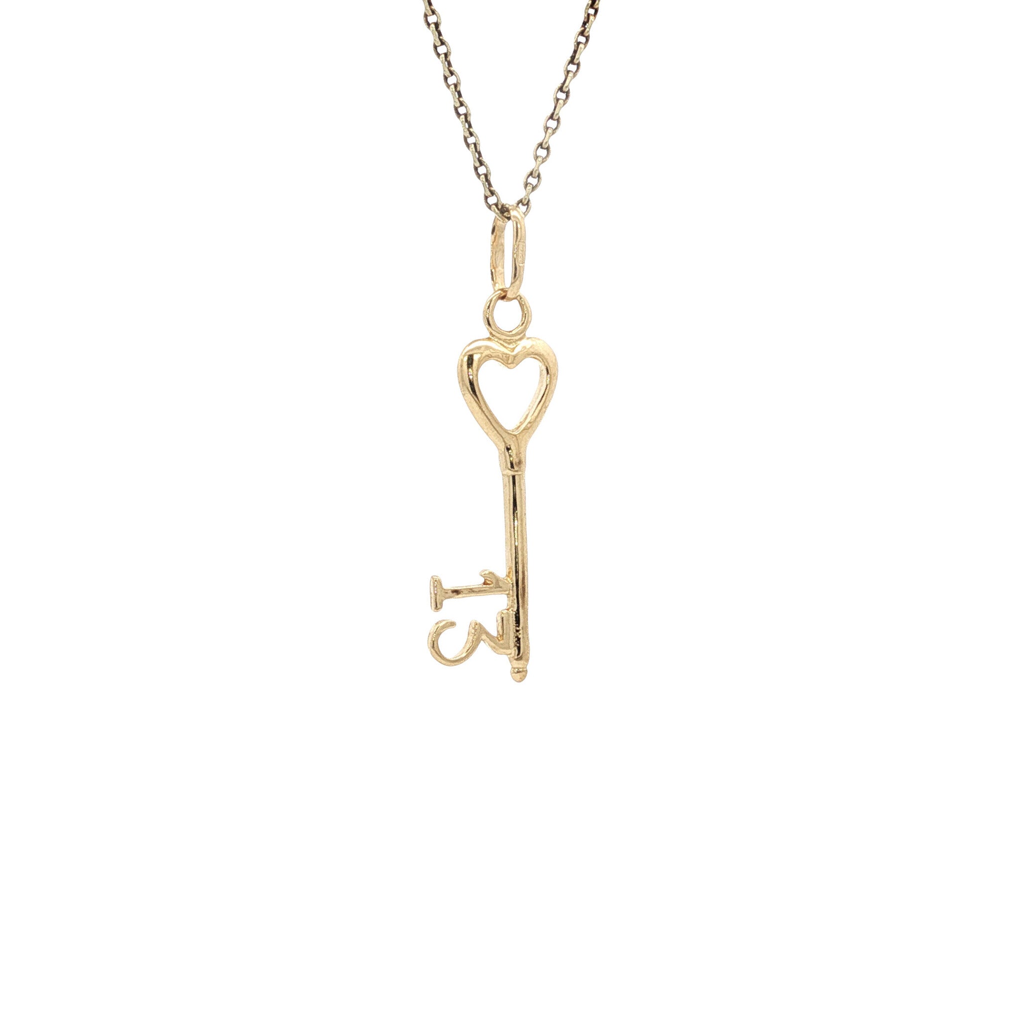Gold key pendant 18 karat