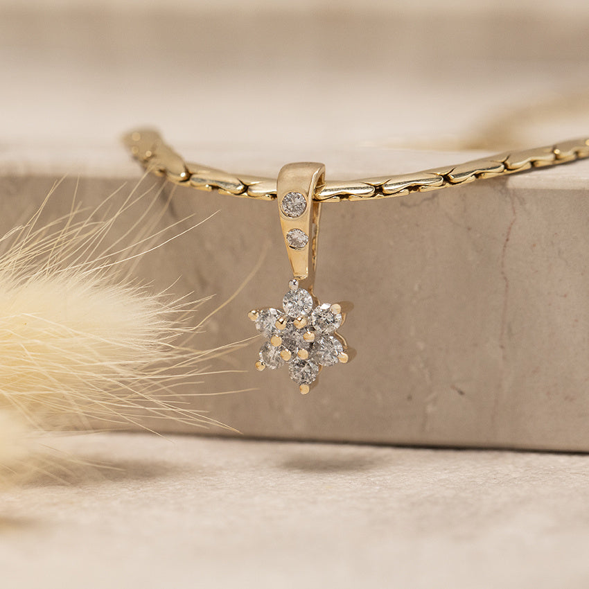 Golden entourage pendant with diamond 14 karat