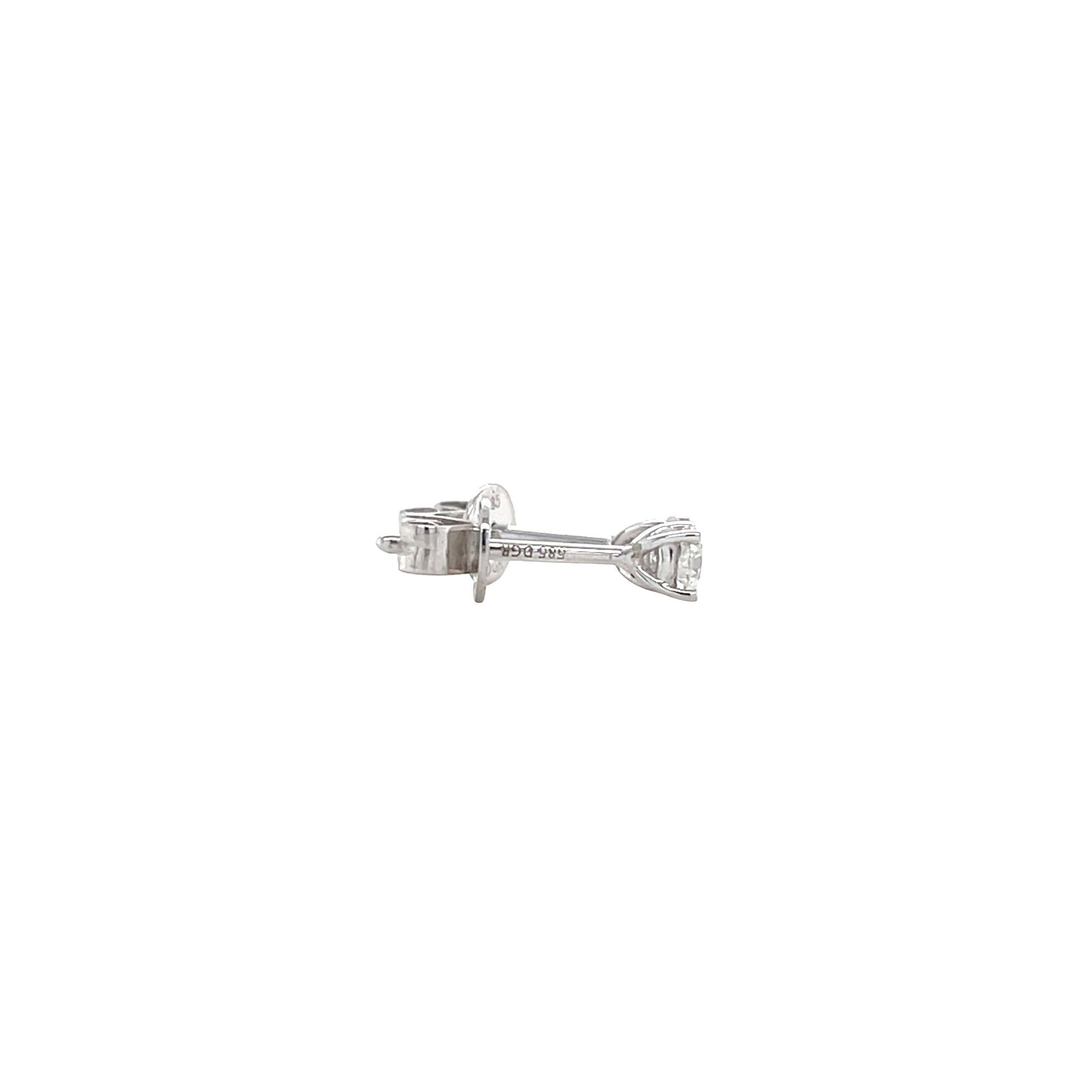 White gold solitaire stud earrings with diamond 14 kt
