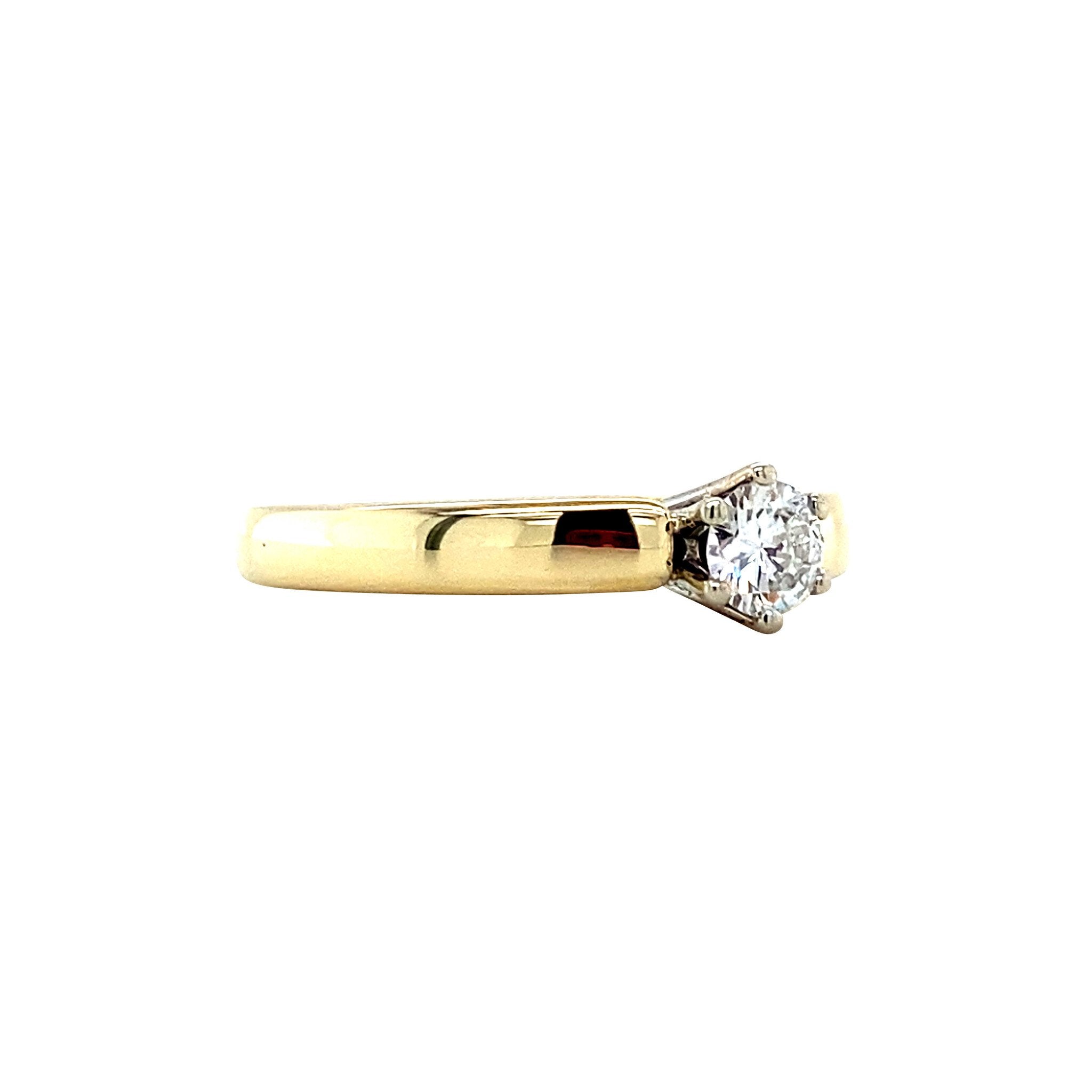 Gold solitaire ring with diamond 14 karat