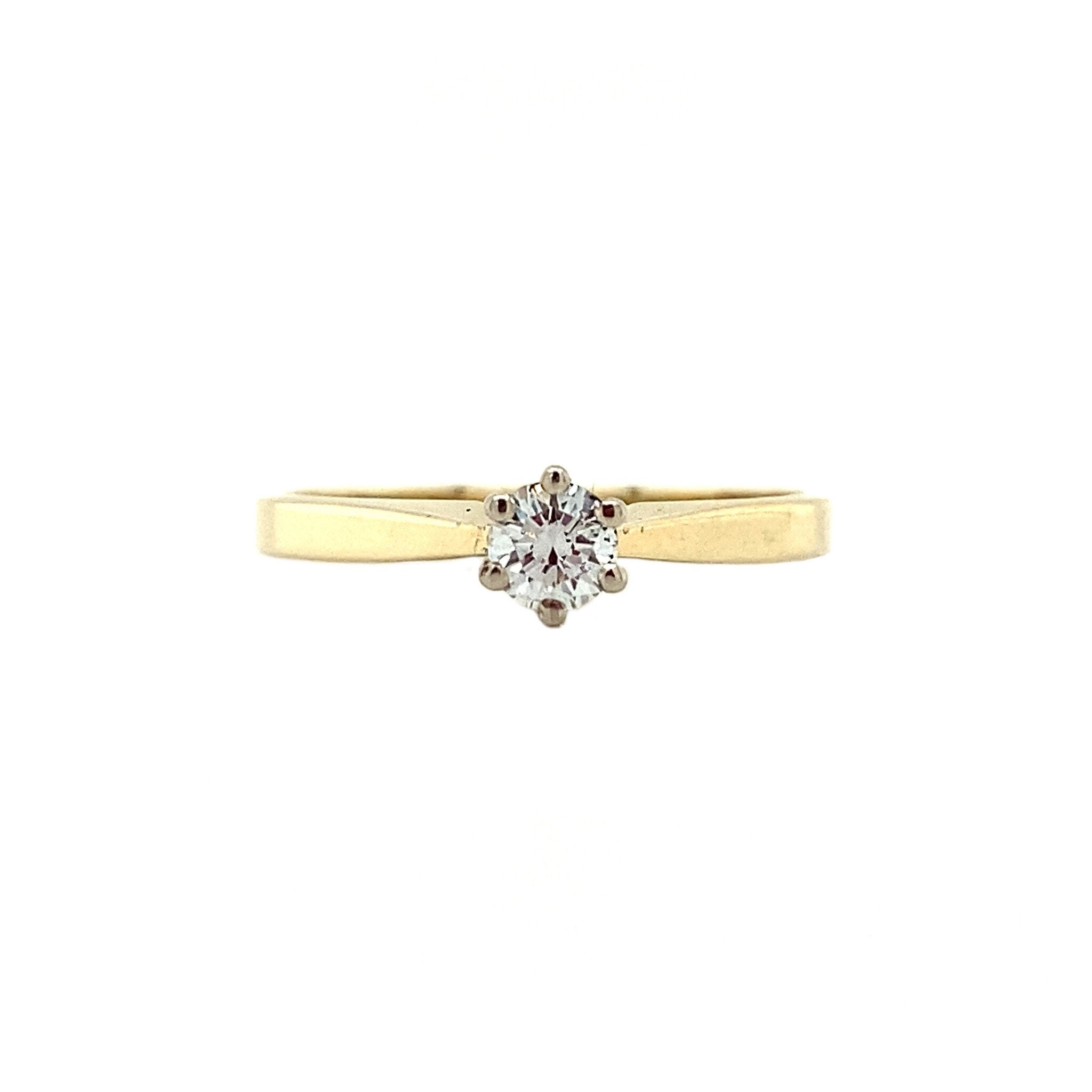 Golden solitaire ring with diamond 14 kt